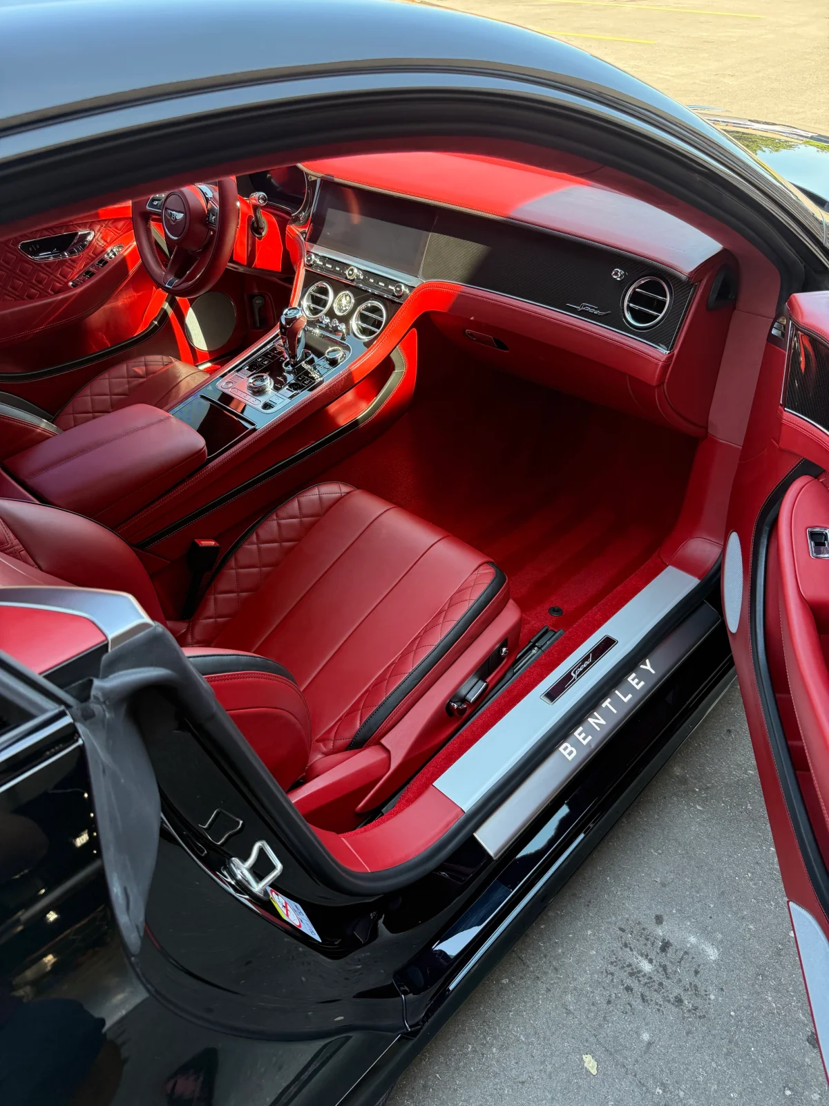 Deep-cleaned luxury car interior with red leather seats after professional auto detailing at Beyond Detail Scarborough