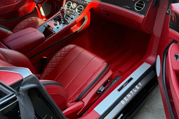 Deep-cleaned luxury car interior with red leather seats after professional auto detailing at Beyond Detail Scarborough