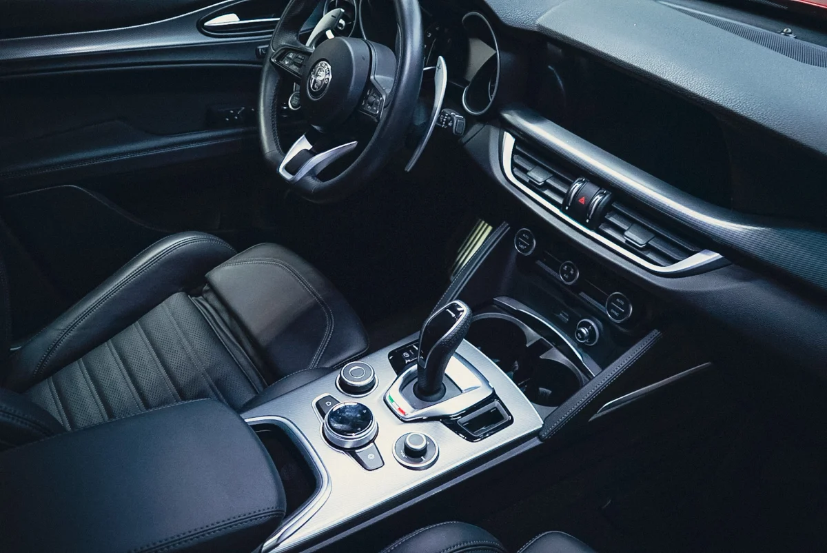 Clean and restored black leather car interior after professional auto detailing at Beyond Detail Scarborough