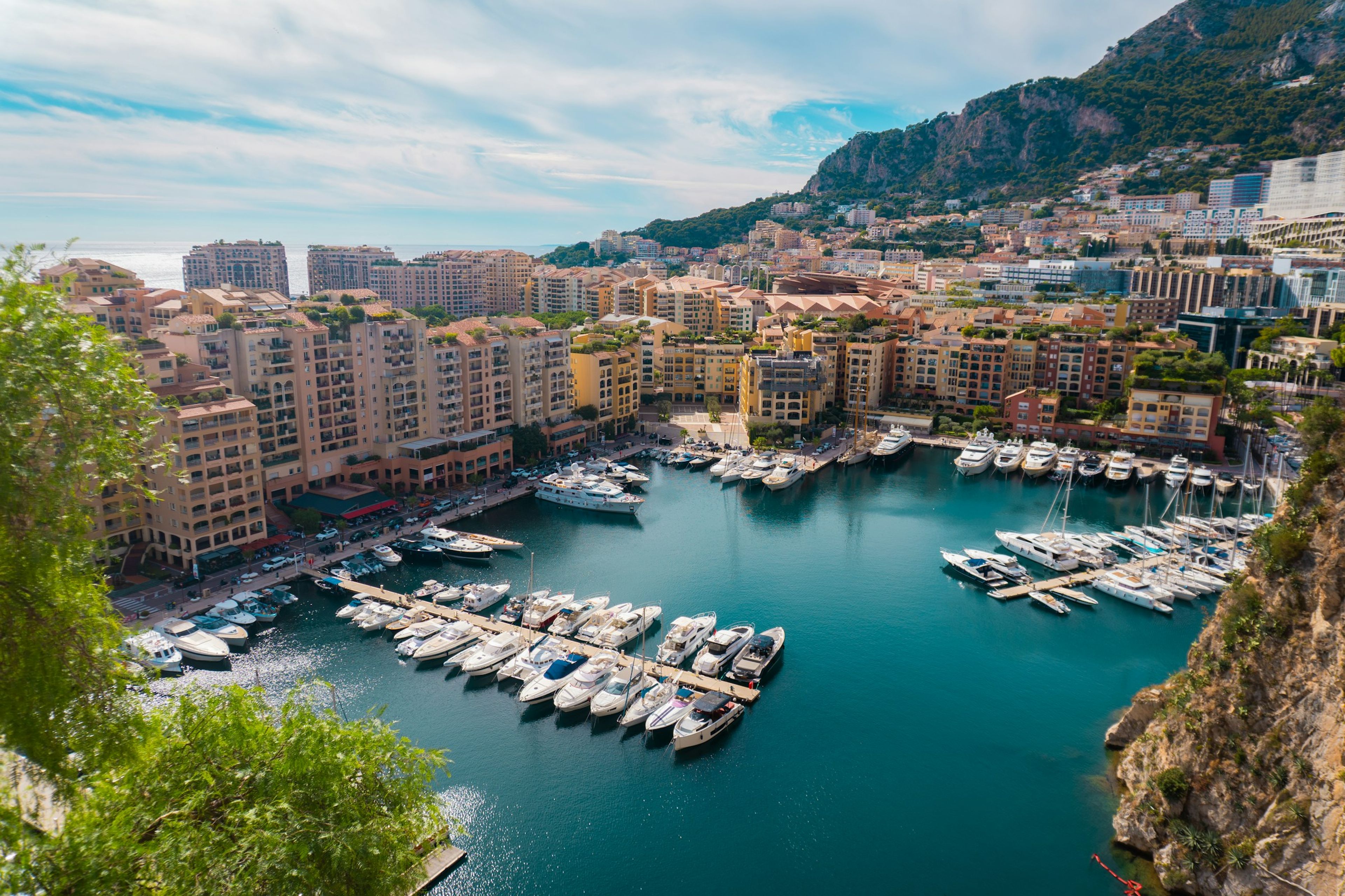 Boats in a Mediterranean harbour below the old town