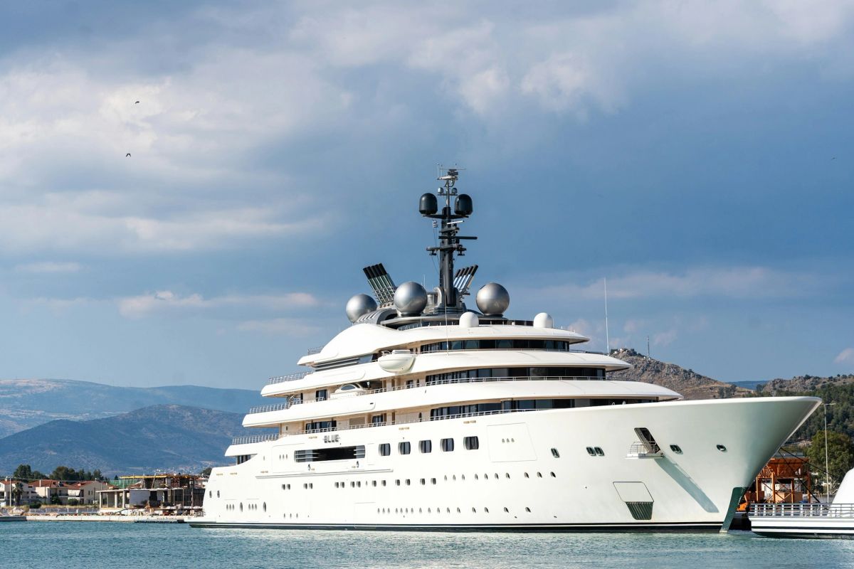 A superyacht moored in a bay