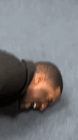 Packed corporate event venue featuring AI-powered holographic wayfinding, smart badges, and ambient lighting