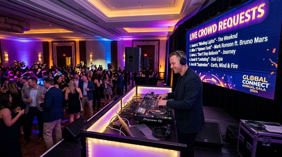 DJ booth with purple and gold lighting at a corporate event with live song request screen