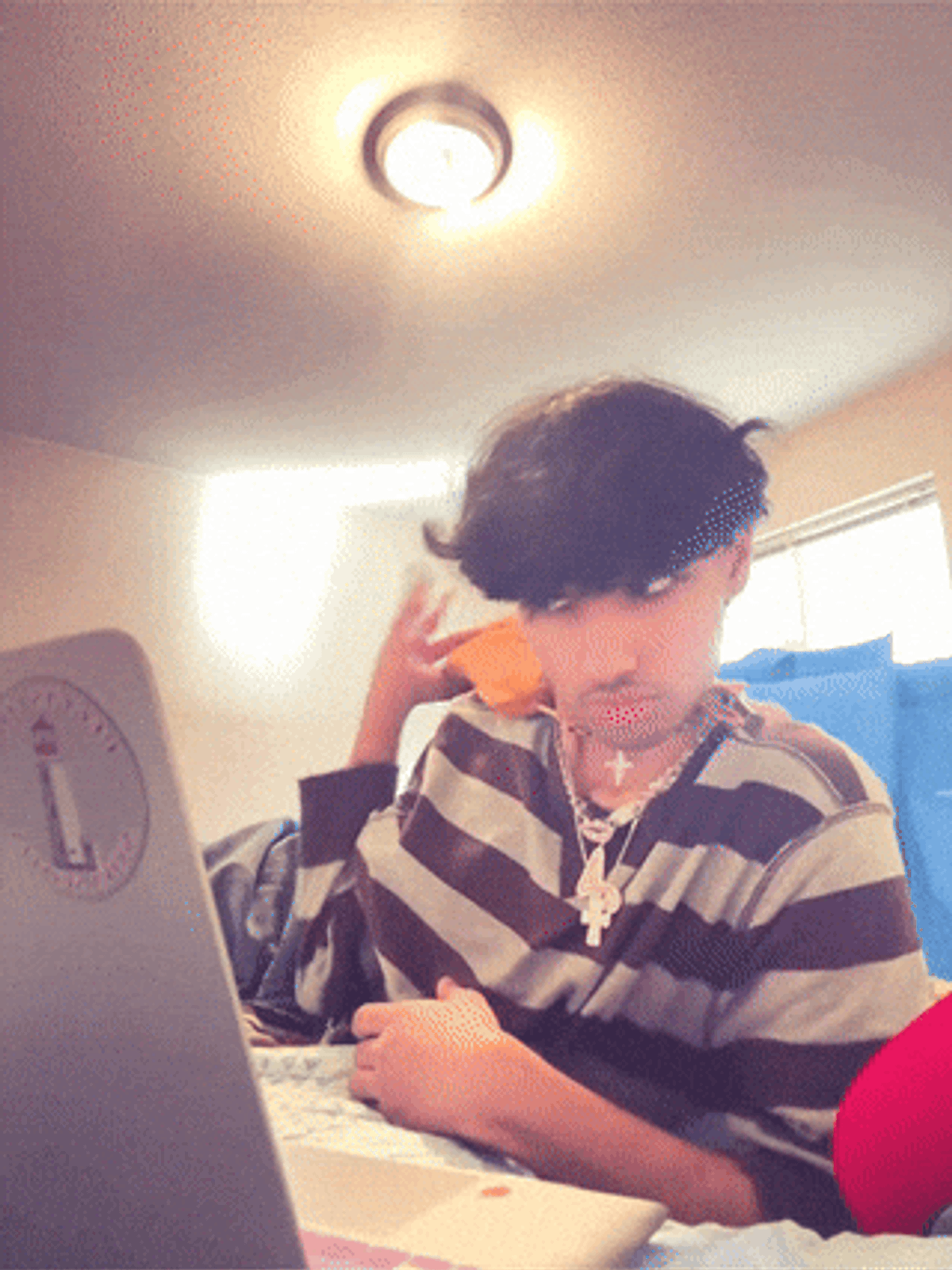 Someone slowly closing a laptop with visible disappointment, like realizing your Spotify playlist isn't cutting it