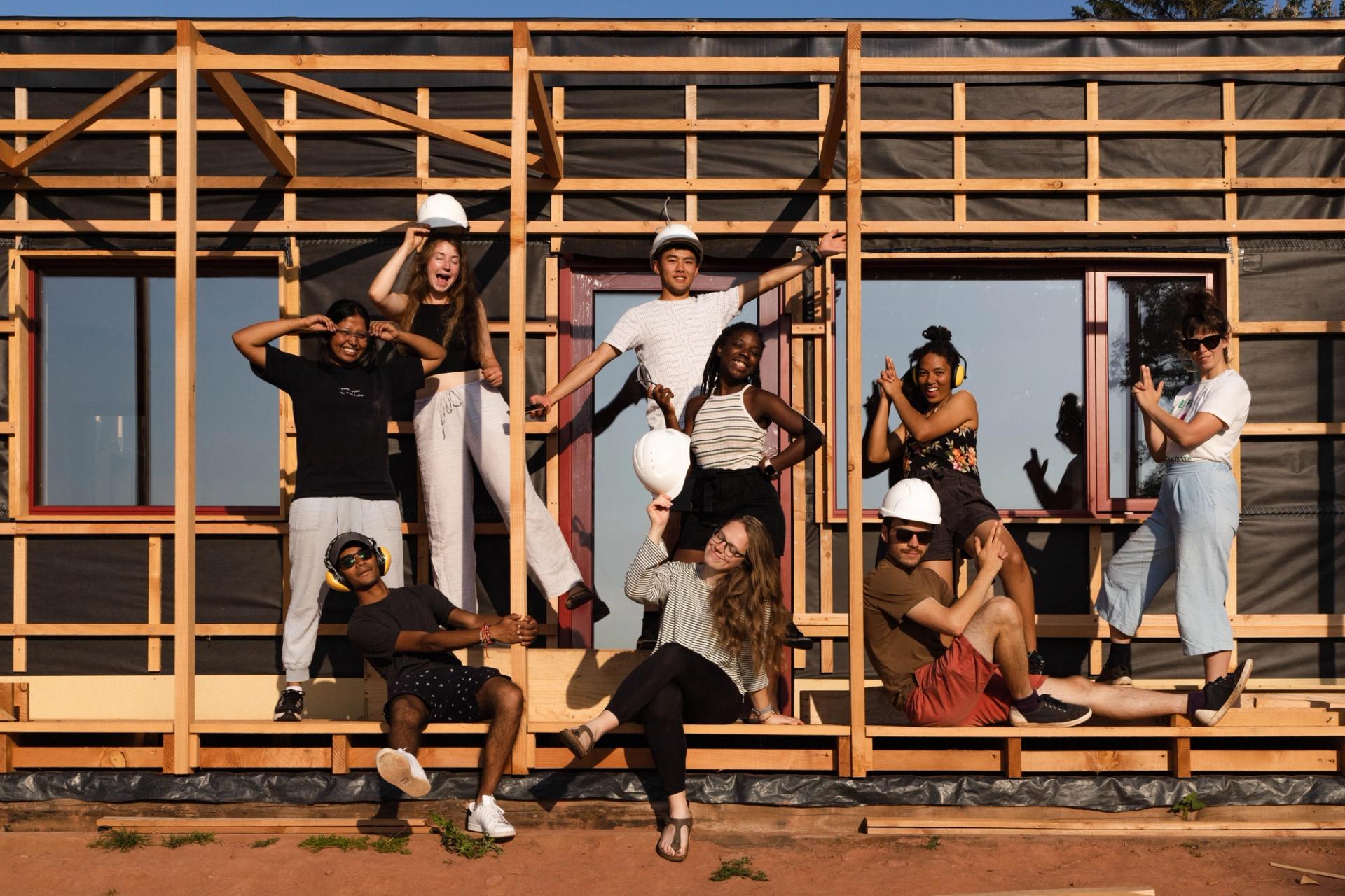 Students on site at Nest House whole life zero carbon home by Studio Bark