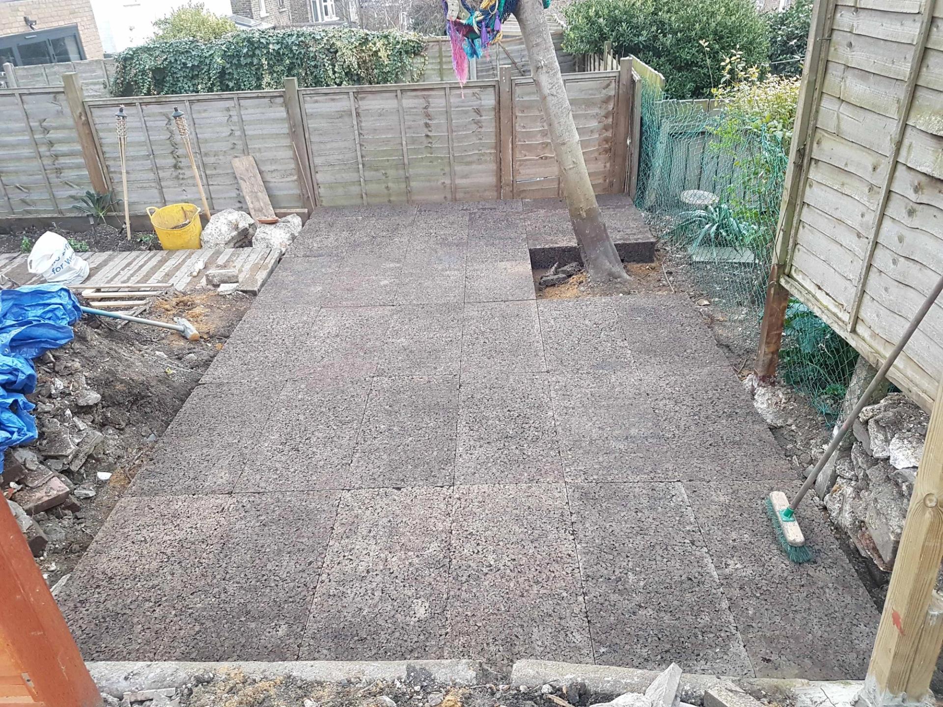 Foundations made from cork panels line the ground