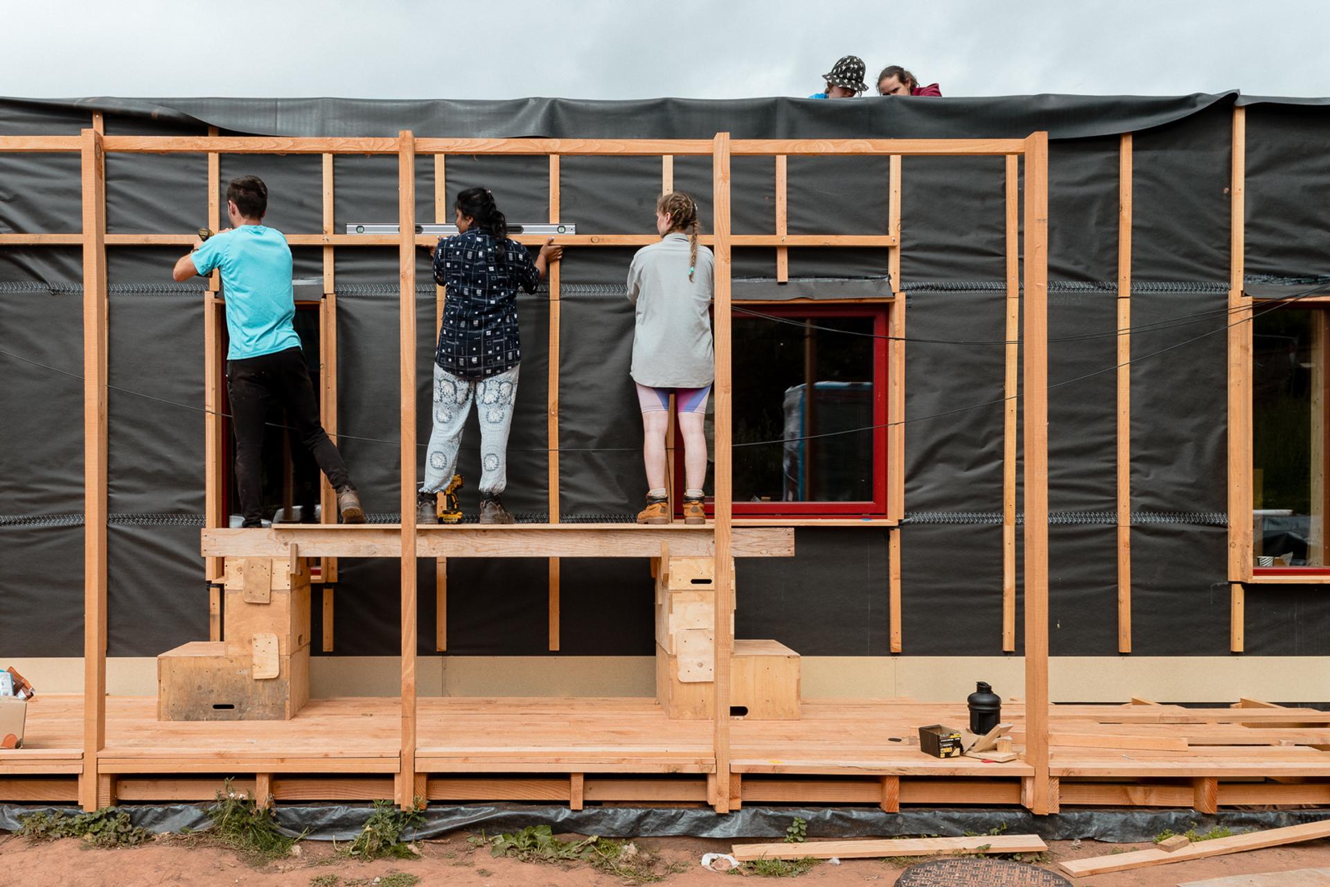 Architecture students learning construction techniques with Studio Bark