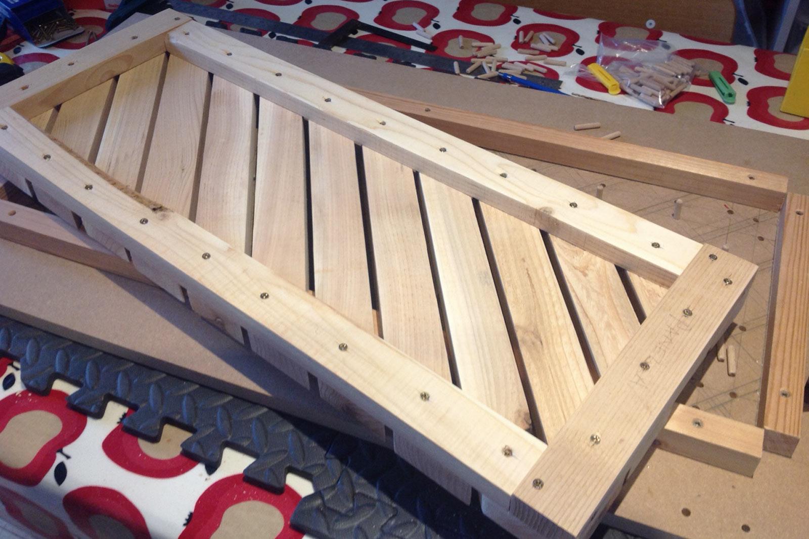Wooden cladding panel for pod