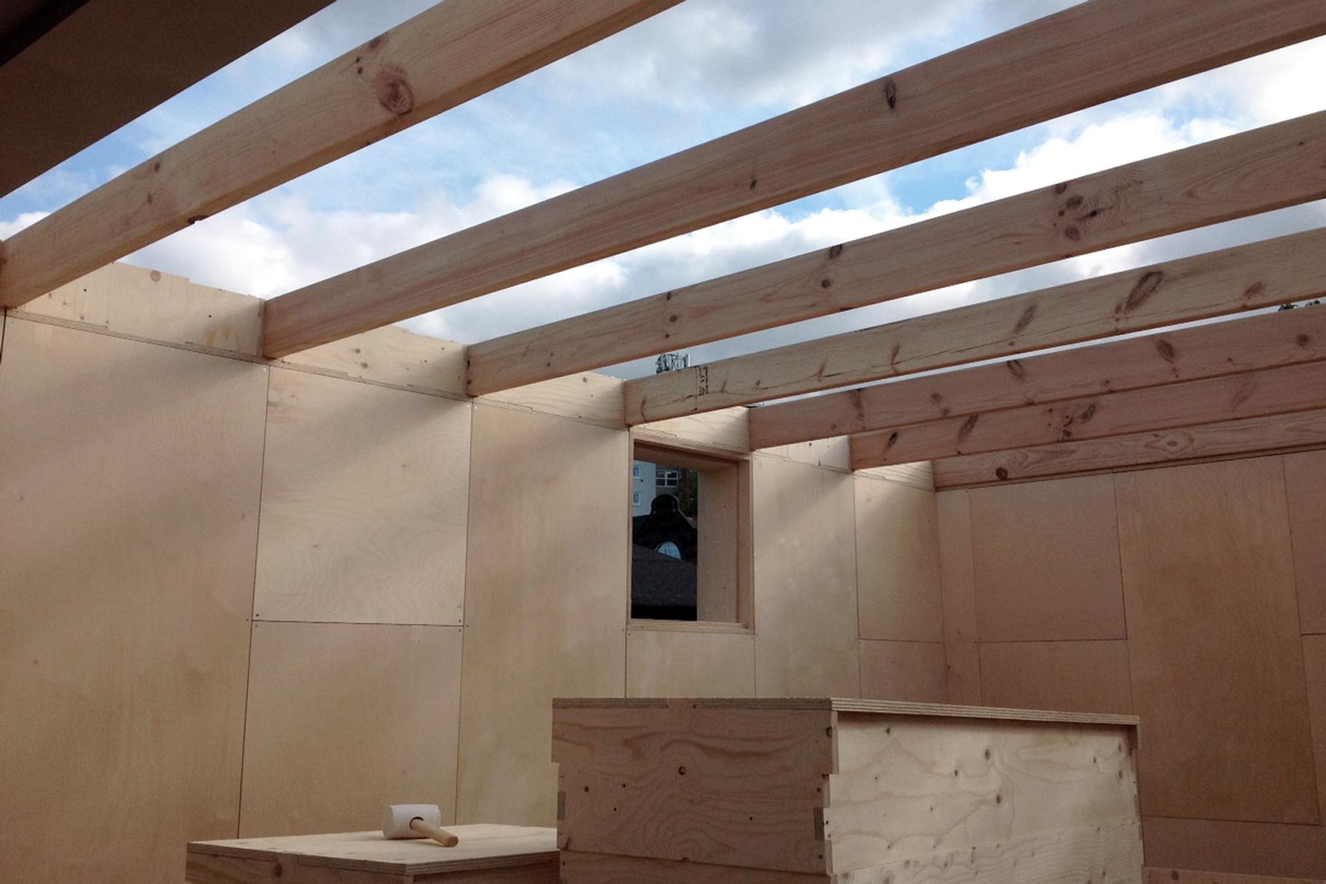 Rafters and roof boxes are assembled as part of the installation 