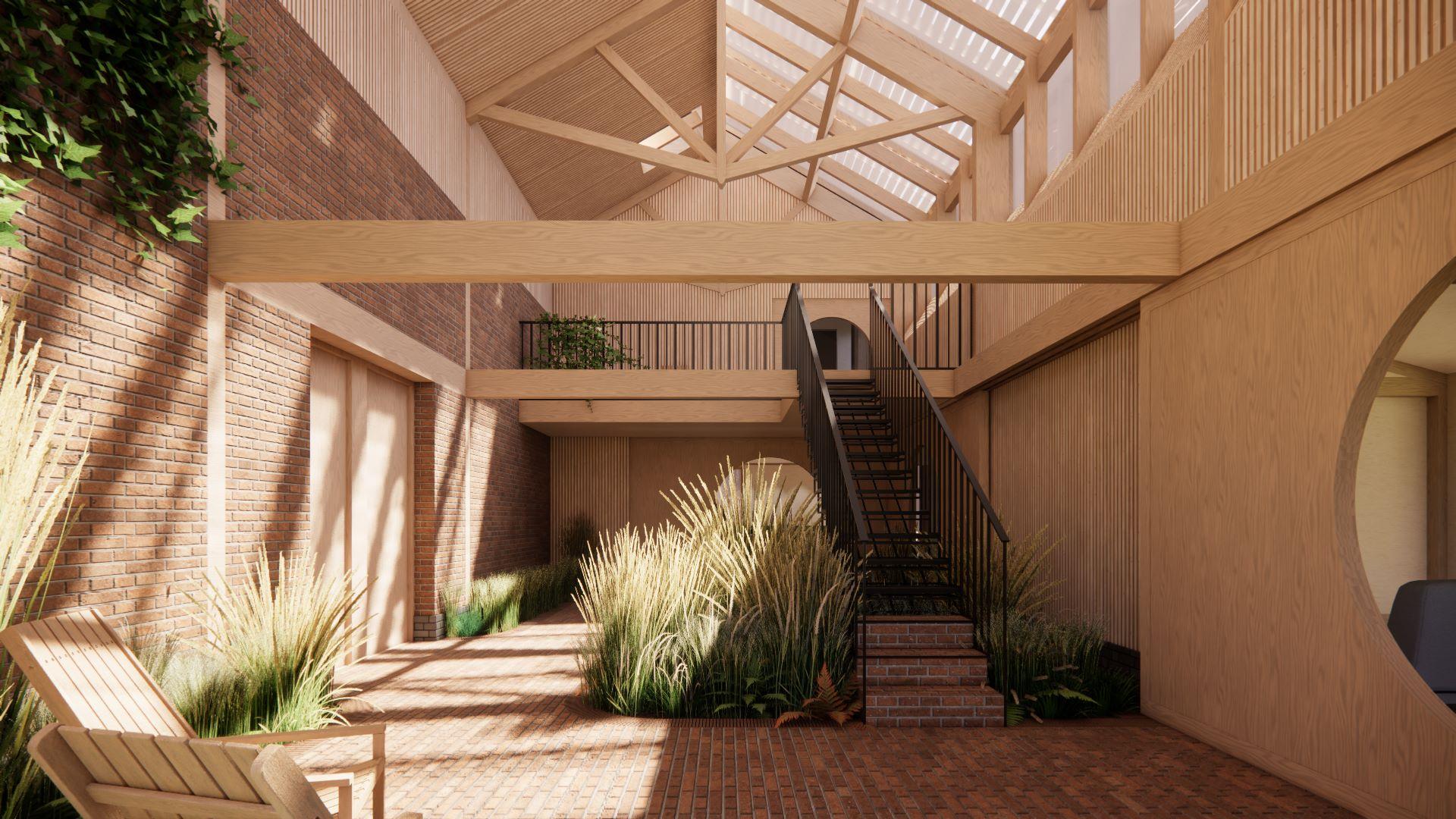 Interior view of atrium with planting and natural light