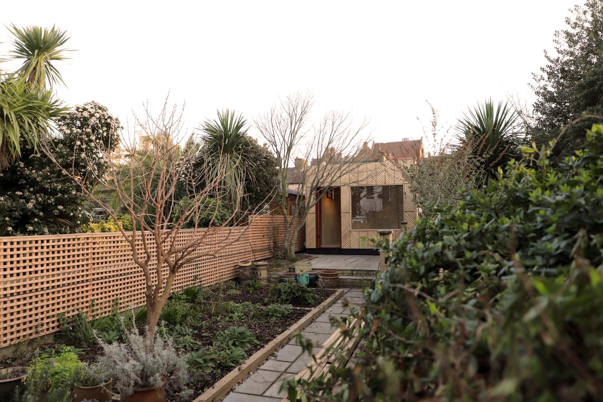 Garden with garden pod at the bottom of garden