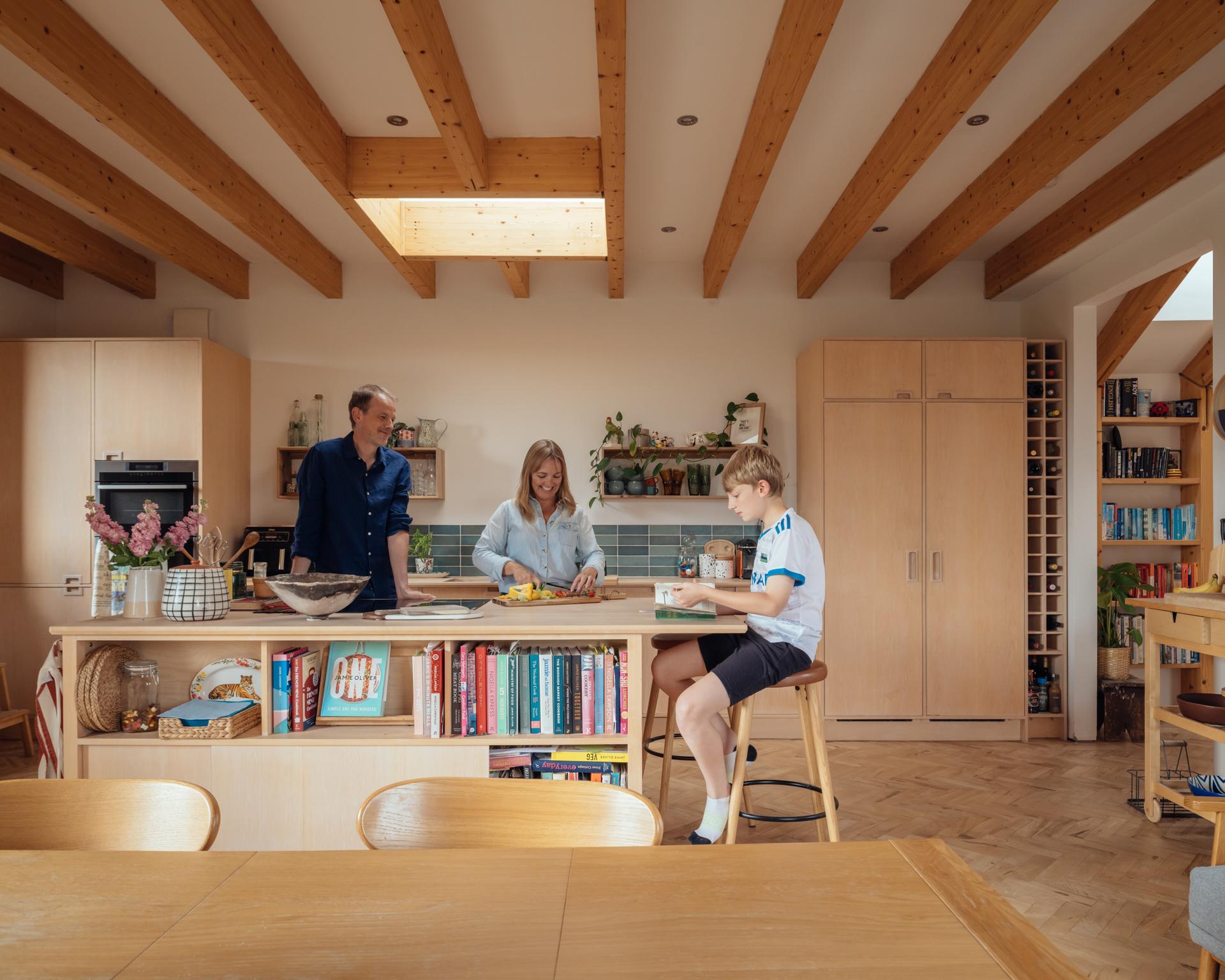 Clients enjoying their new accessible off-grid home by Studio Bark architects