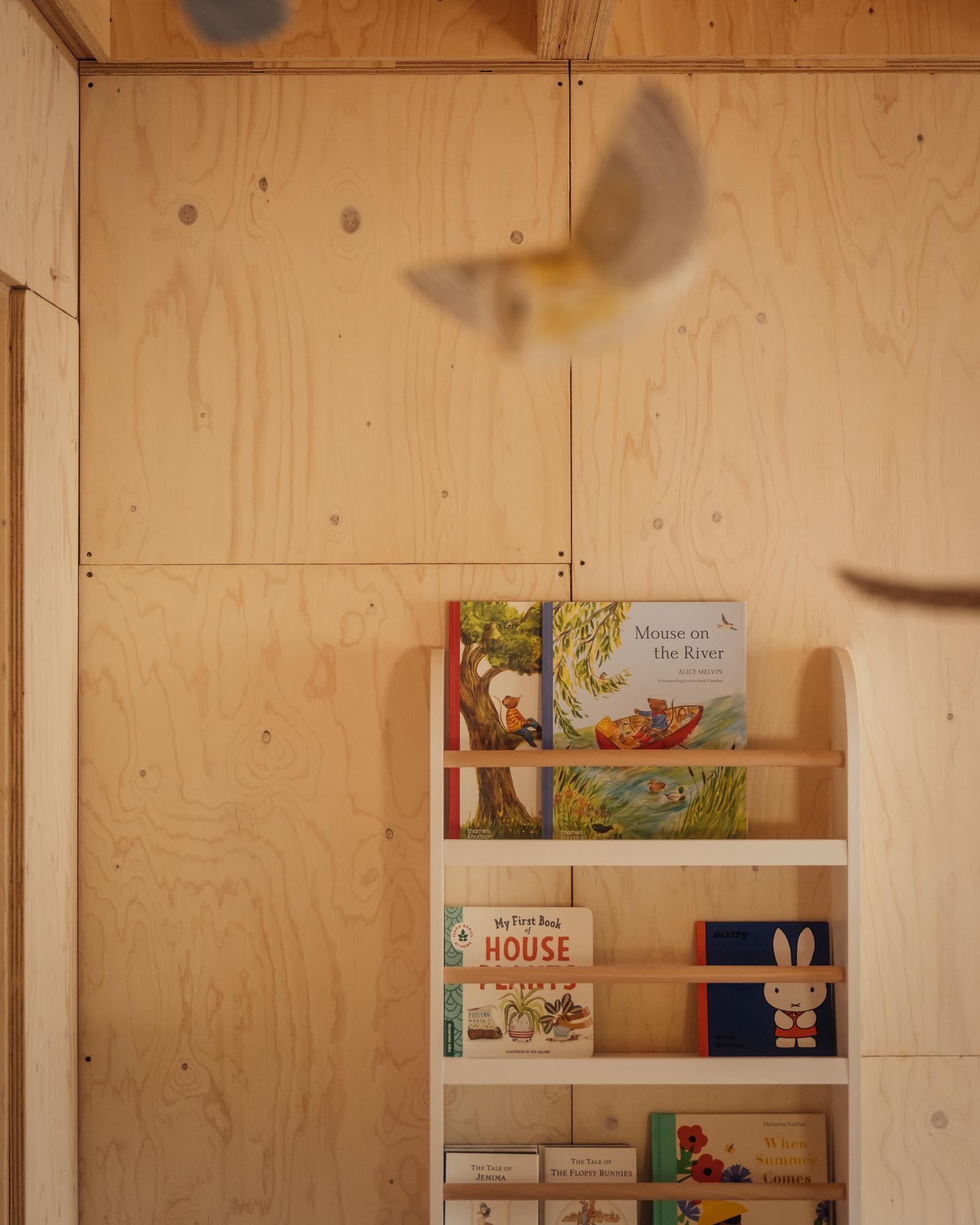 Contemporary storage in timber containing children's picture books