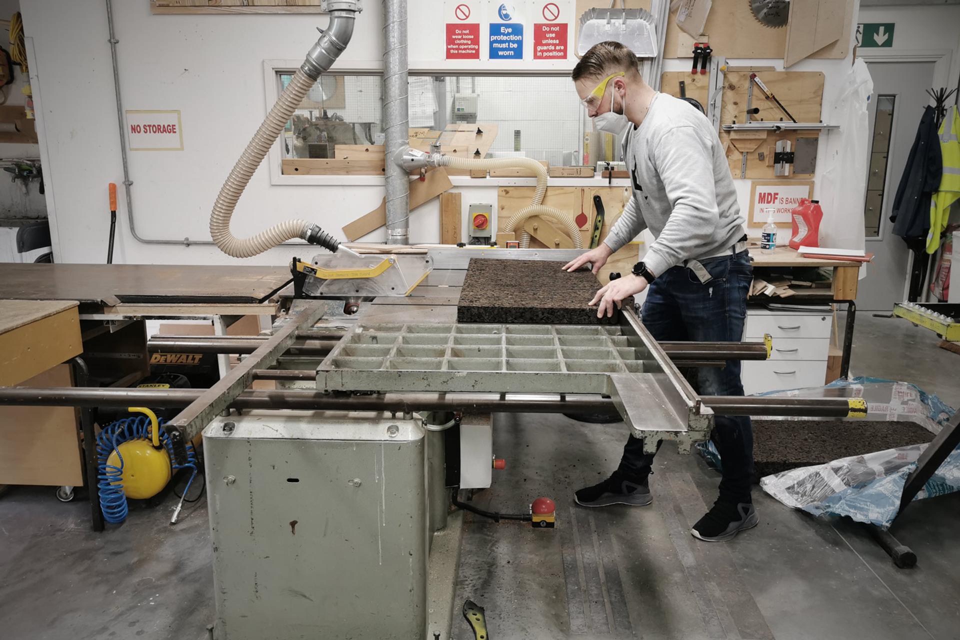 Photo of person working with cork material