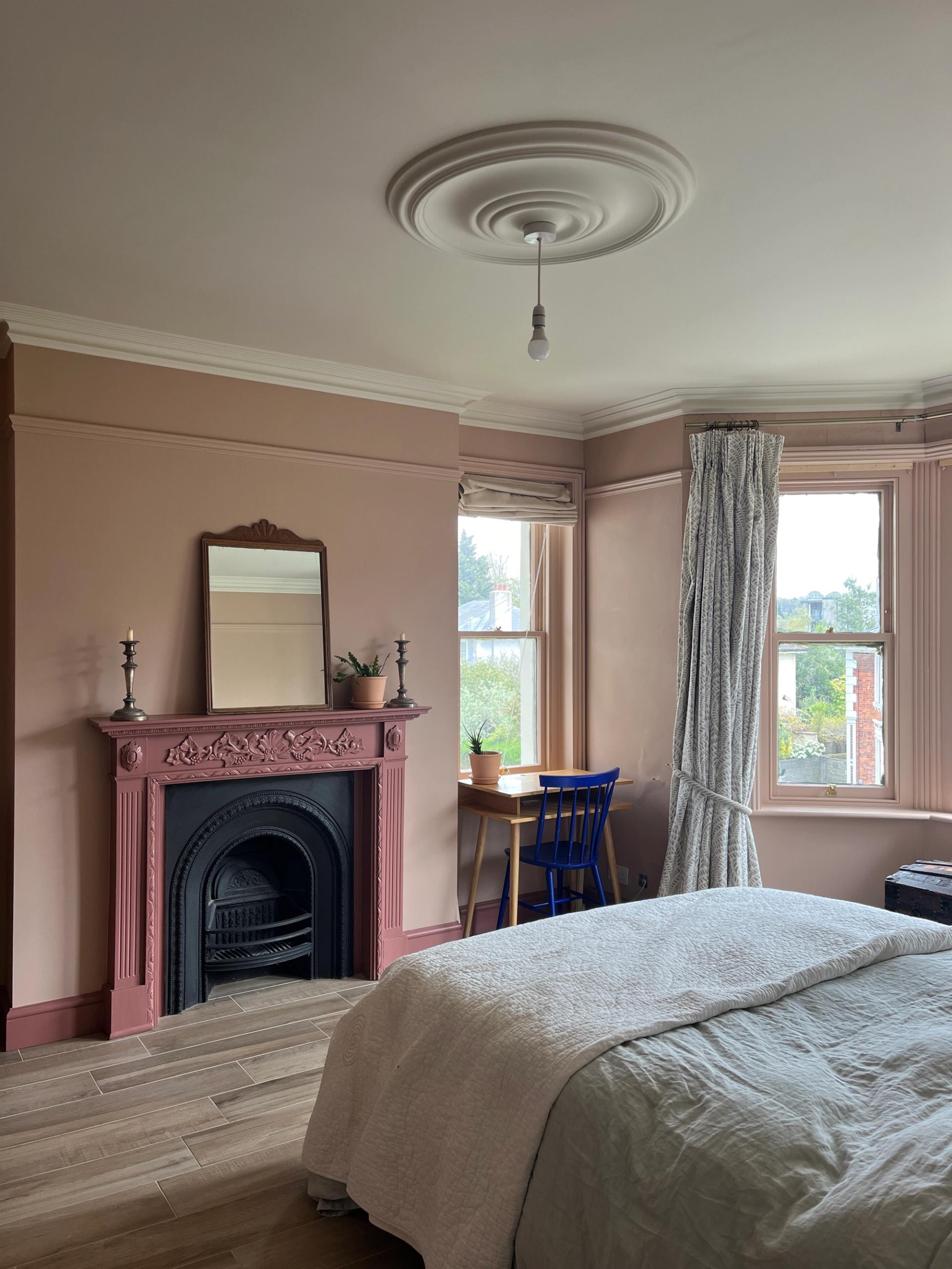 Soft pink bedroom with late Victorian features