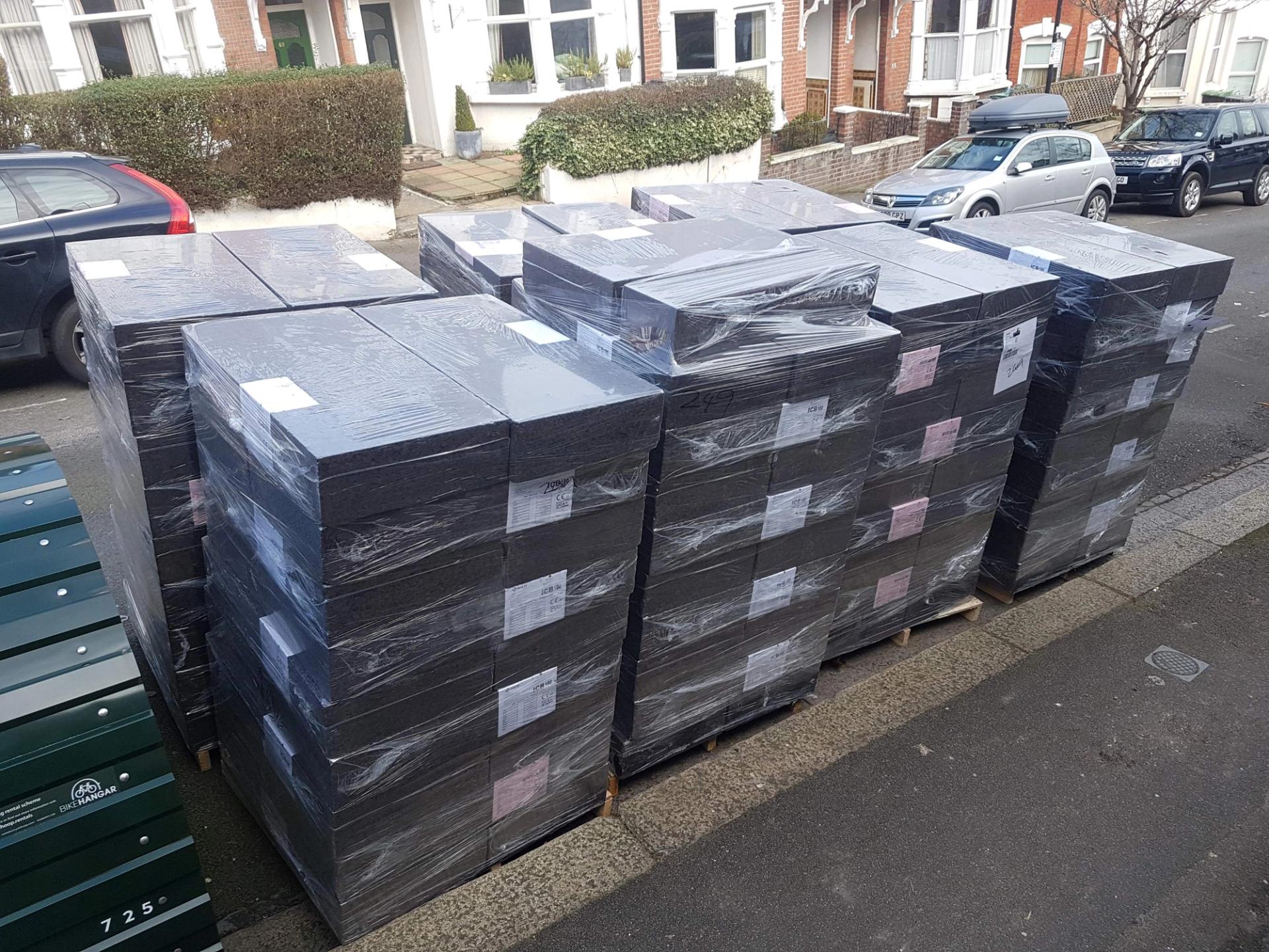 Stacked and sealed cork panels on road for the Cork Studio