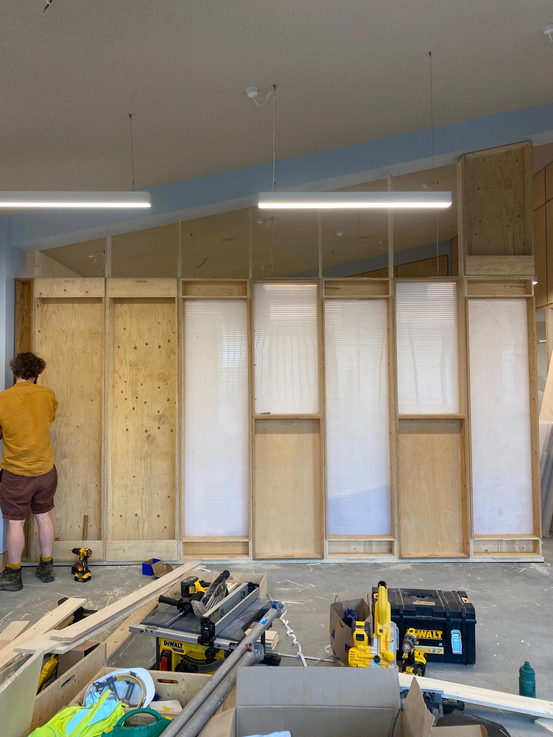 Wall made of reclaimed U-Build boxes