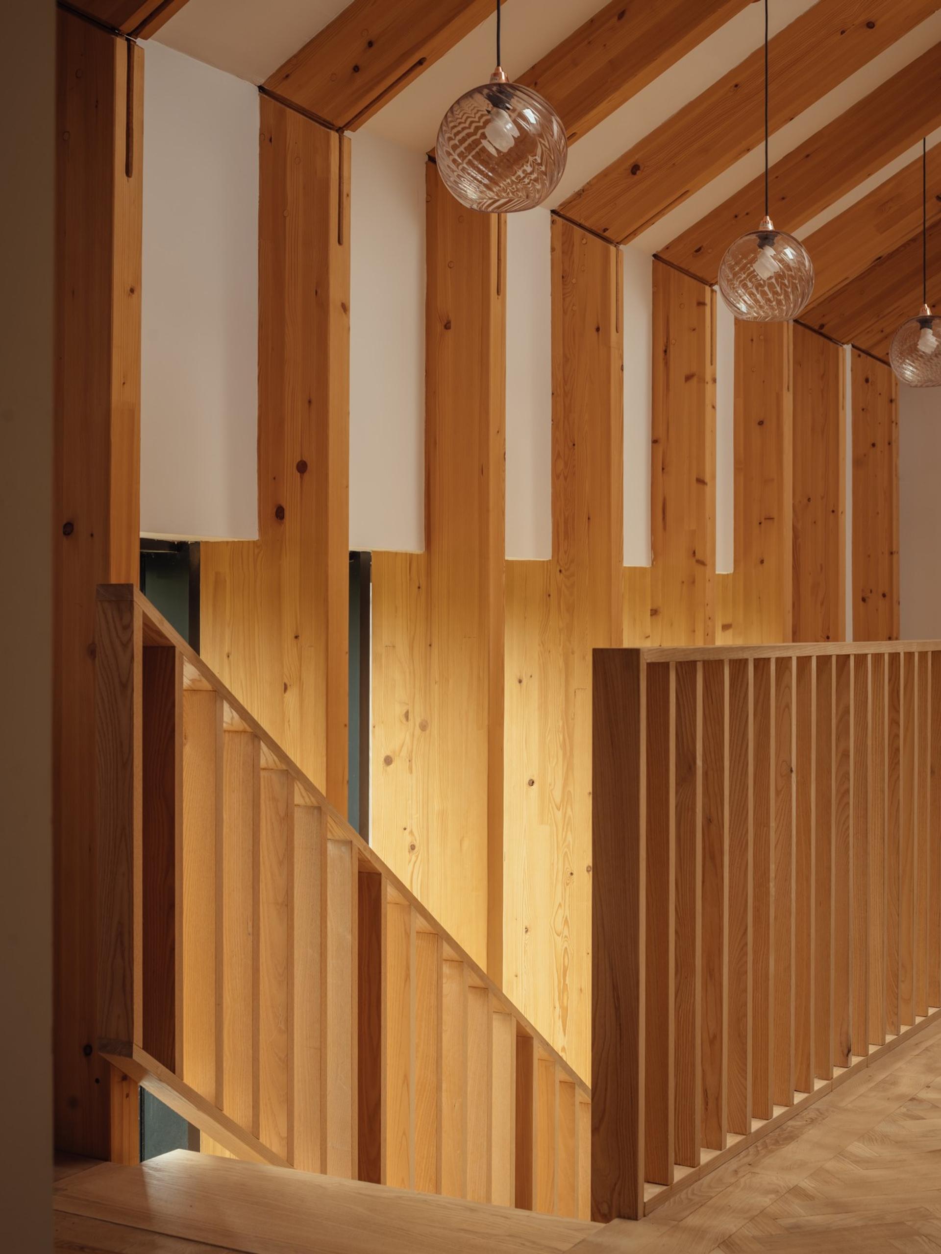 Orchard House by Studio Bark interior view - upstairs stairwell