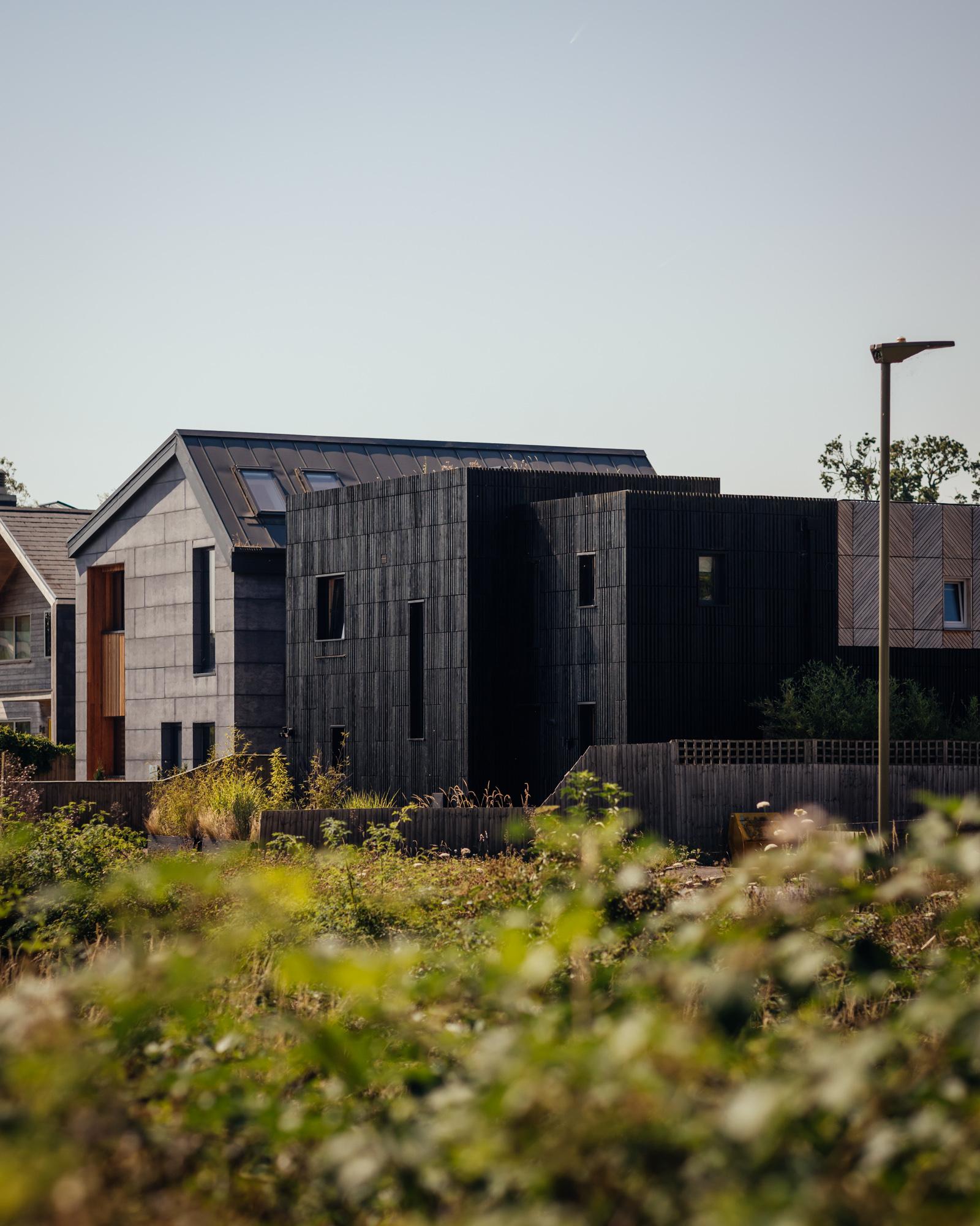 View of Box House next to its new neighbour