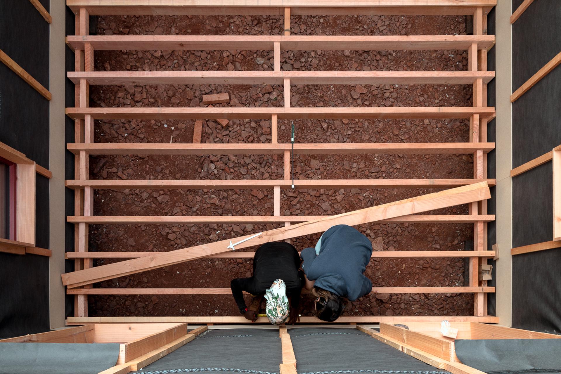Architecture students learning construction techniques with Studio Bark