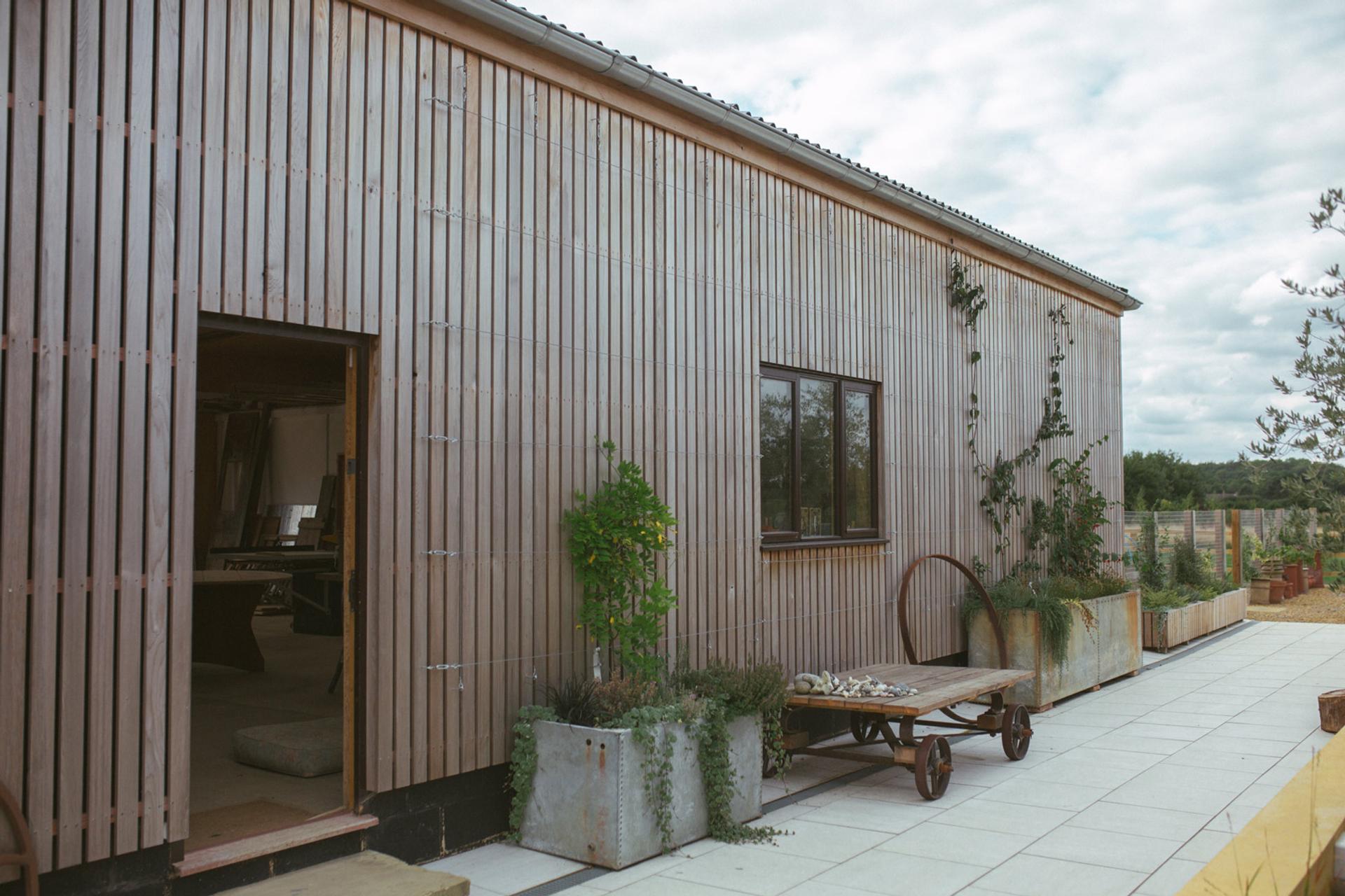 Aesthetics and environmental excellence come together for a unique home featuring artisan workshop spaces