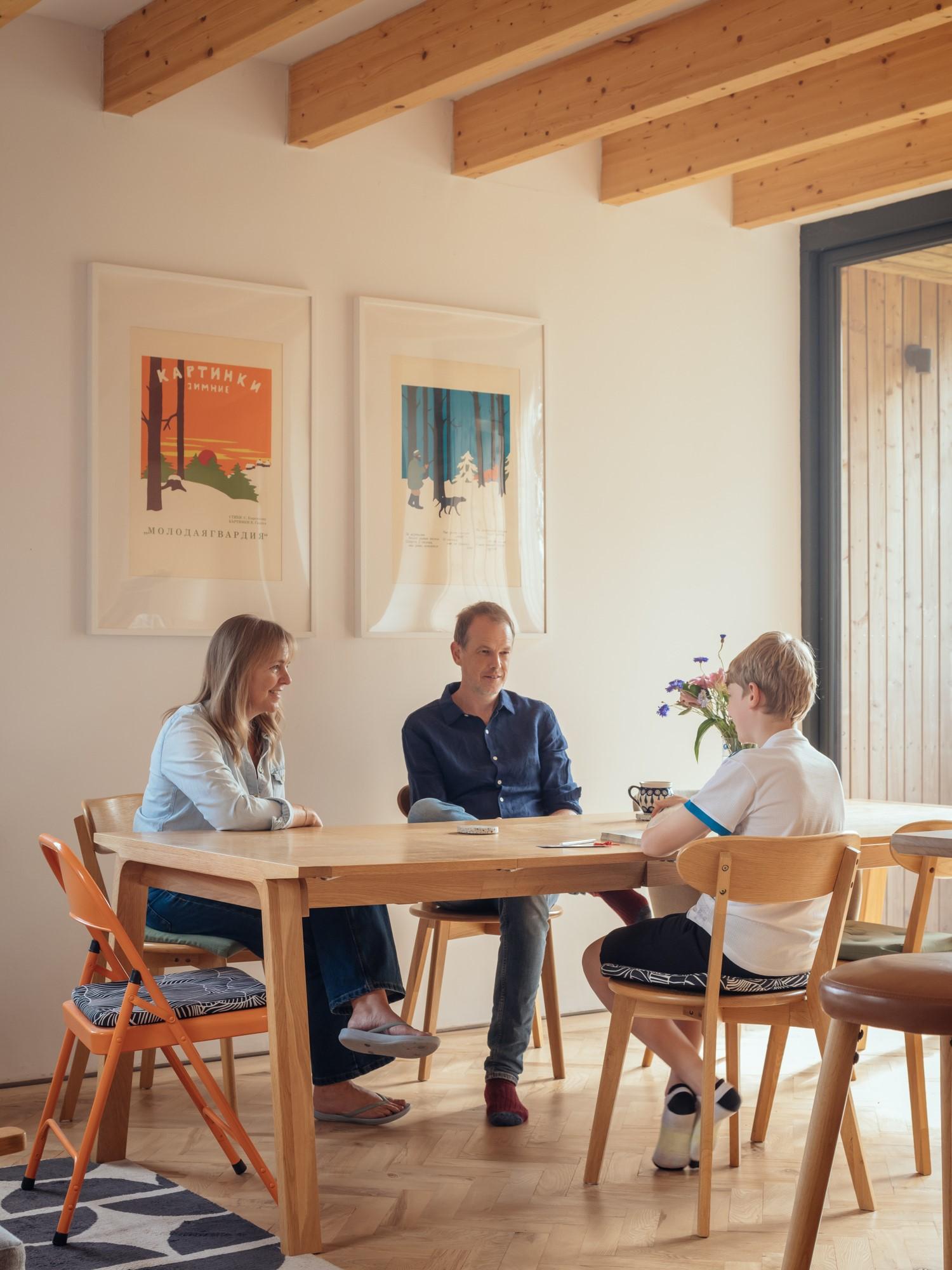 Orchard House by Studio Bark interior view - dining table with people