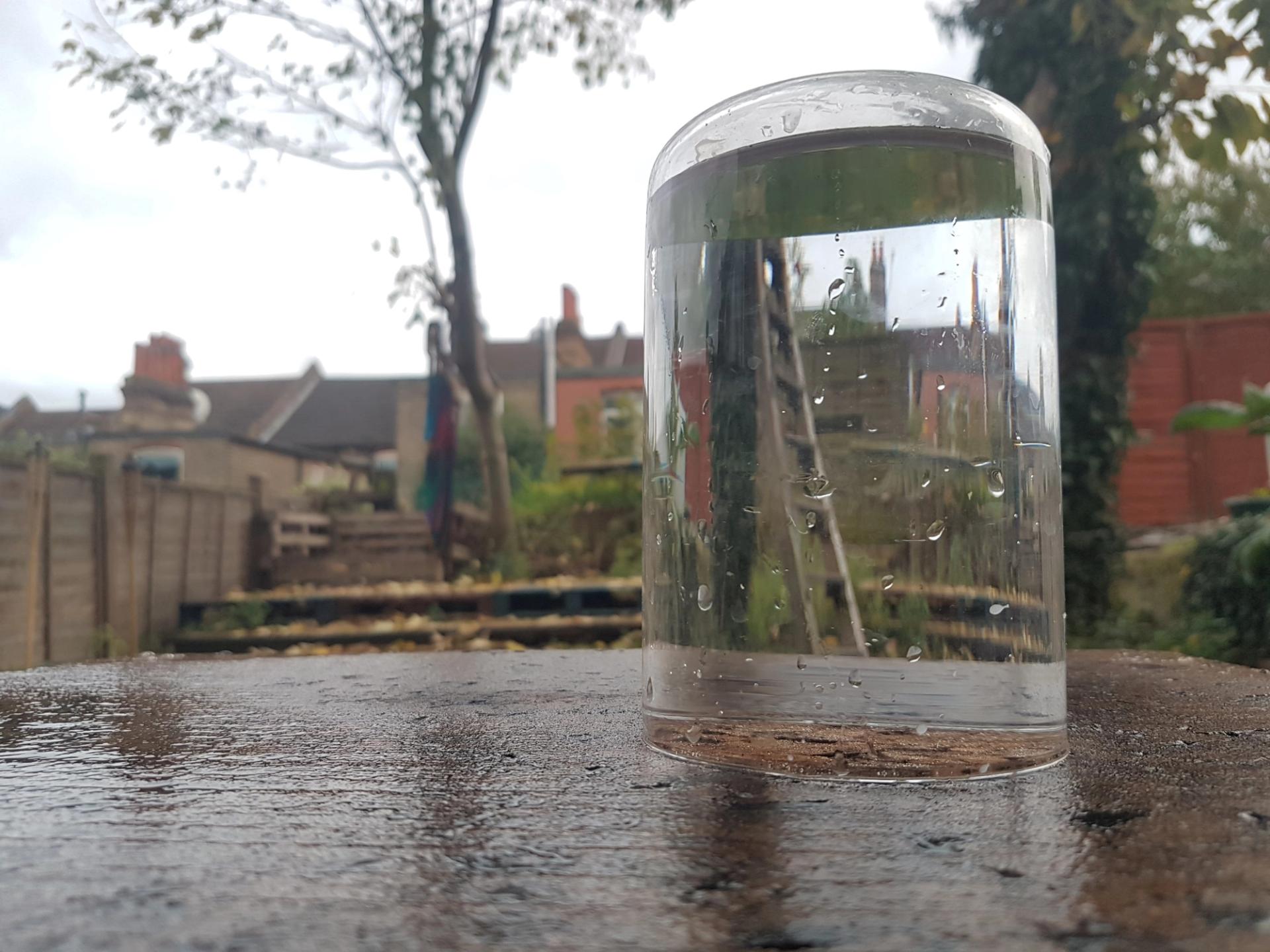 Water testing with glass filled and turned upside down on cork block