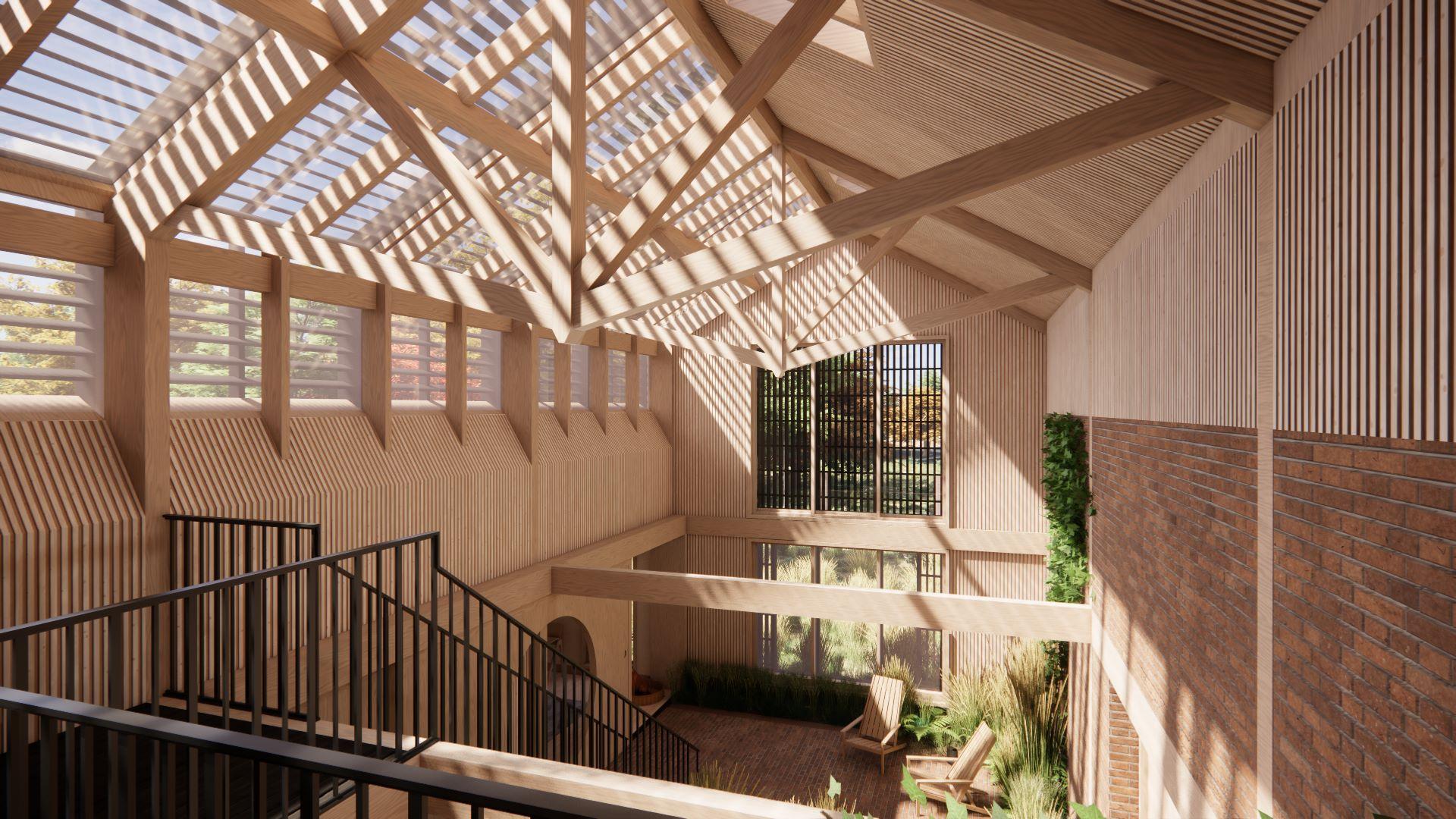 Interior view of atrium with planting and natural light