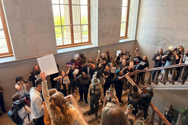 Protestors fill a staircase at the Tennessee Capitol. (Photo by Jacob Holley)