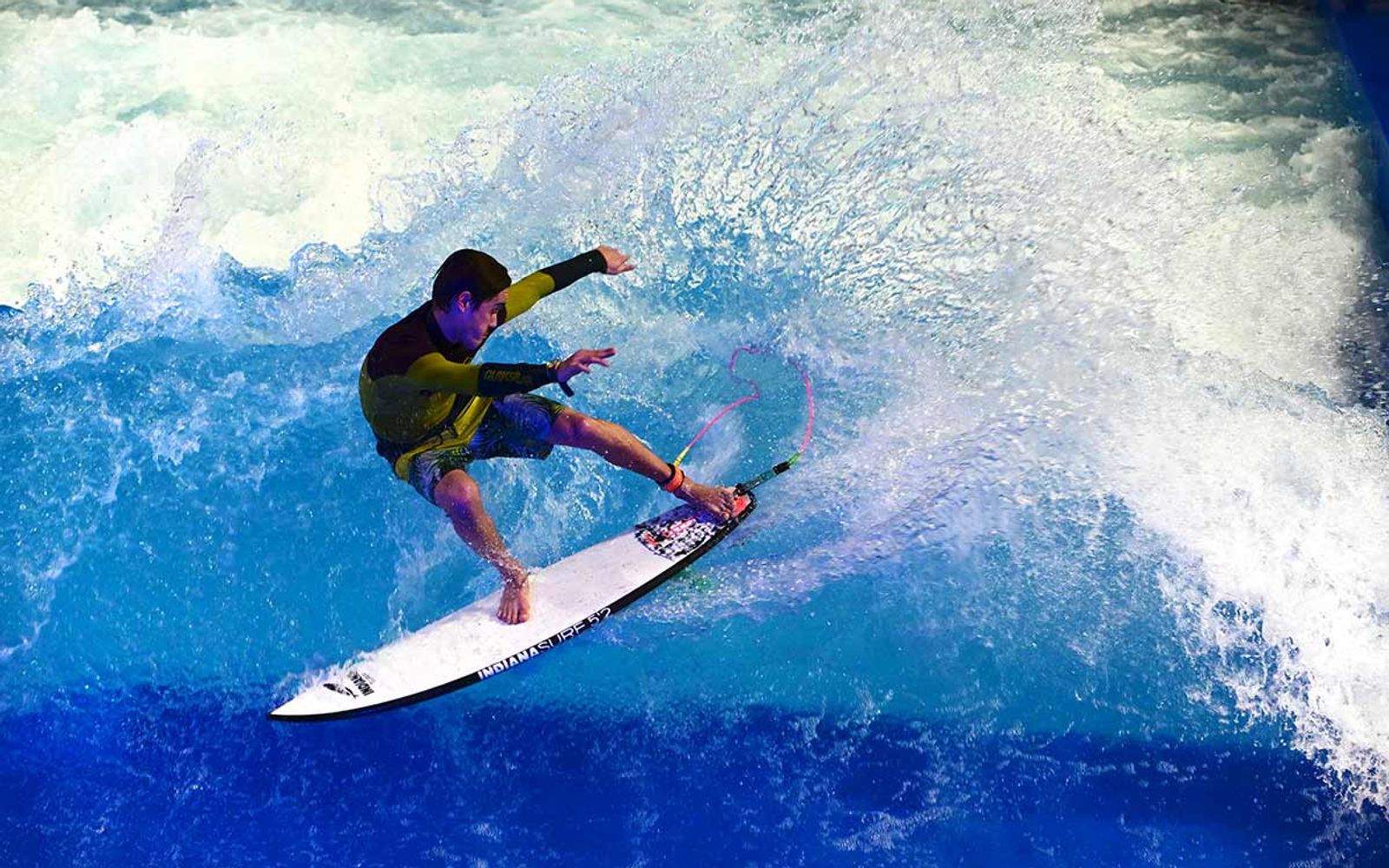 A surfer turning on the indoor Citywave at The Glassy House.