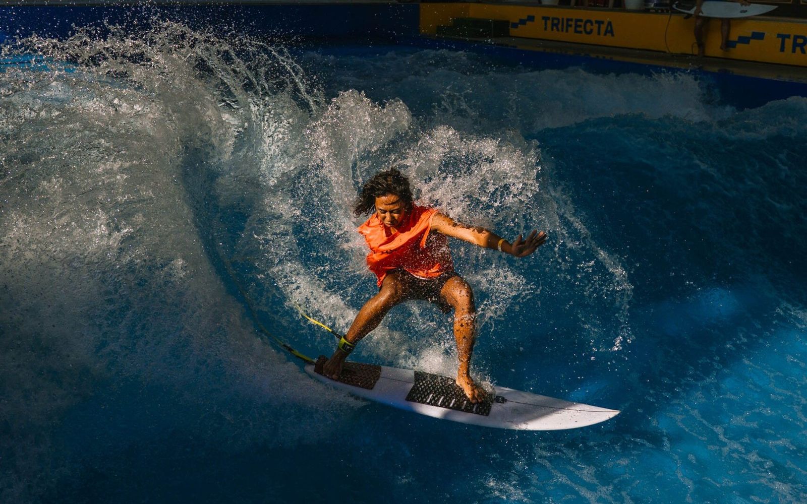 A surfer on TRIFECTA's indoor wave in Singapore.