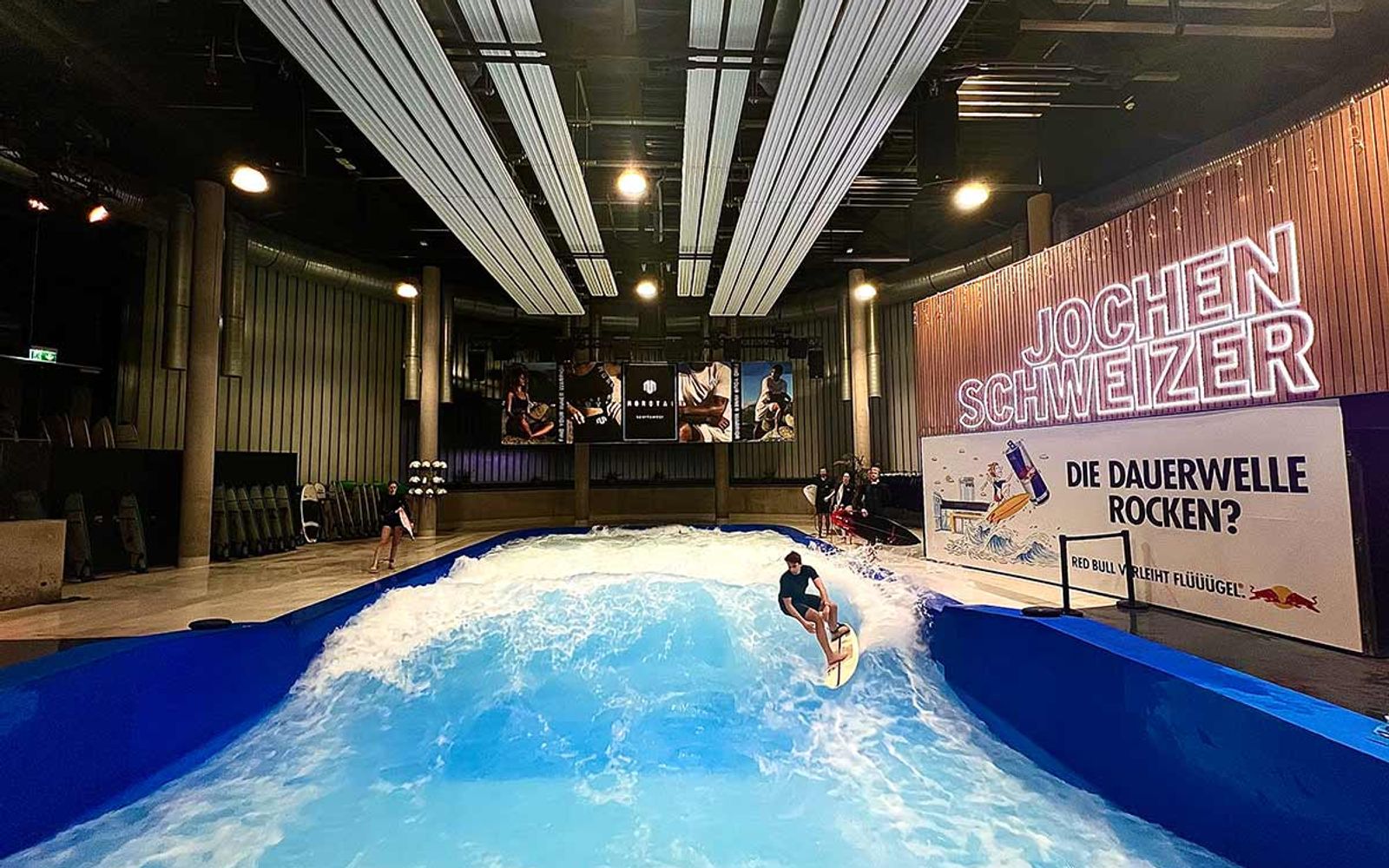 A surfer on the indoor wave at the Jochen Schweizer Arena near Munich.