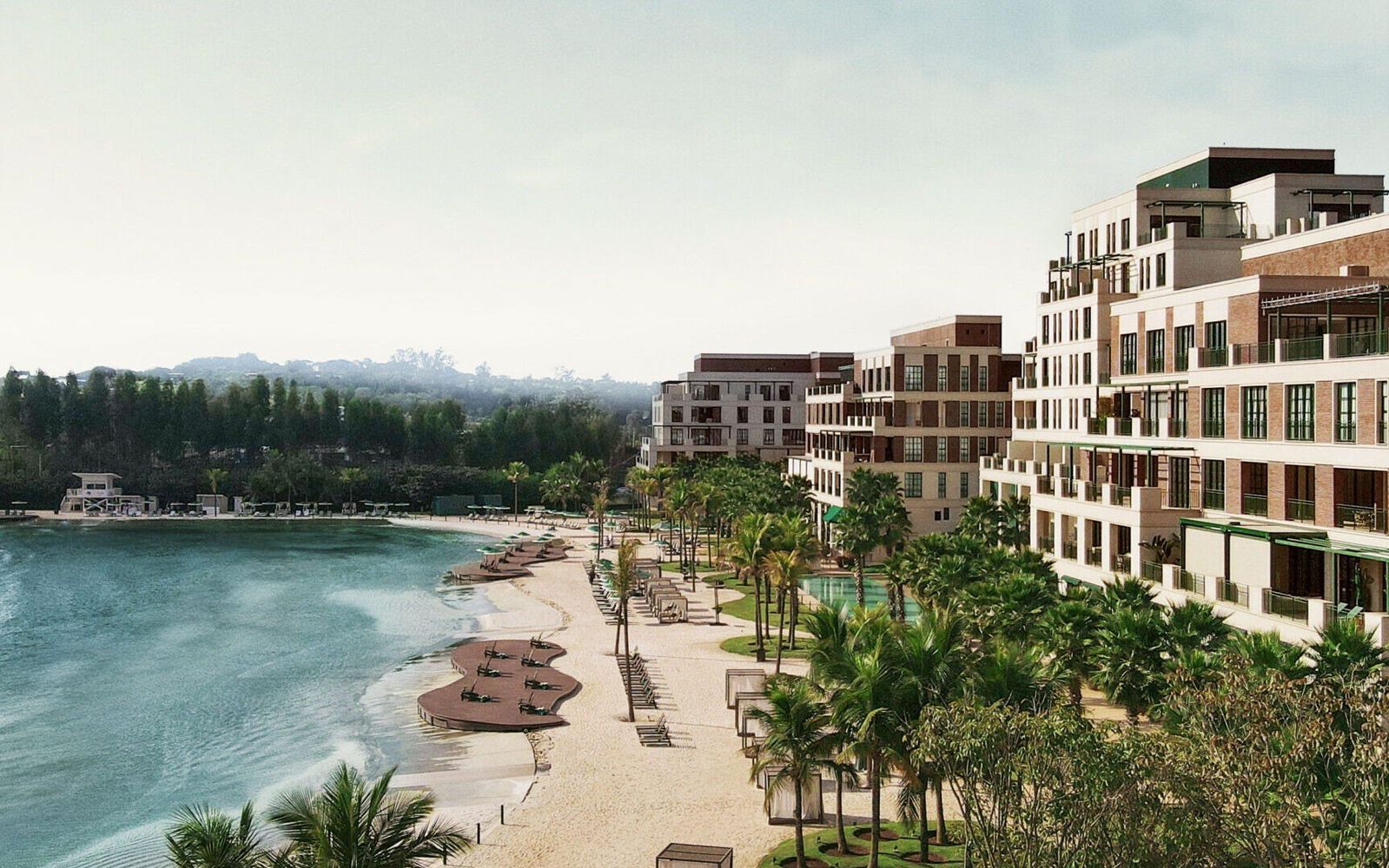 Boa Vista Village's beach and PerfectSwell lagoon, with residences along the shore.