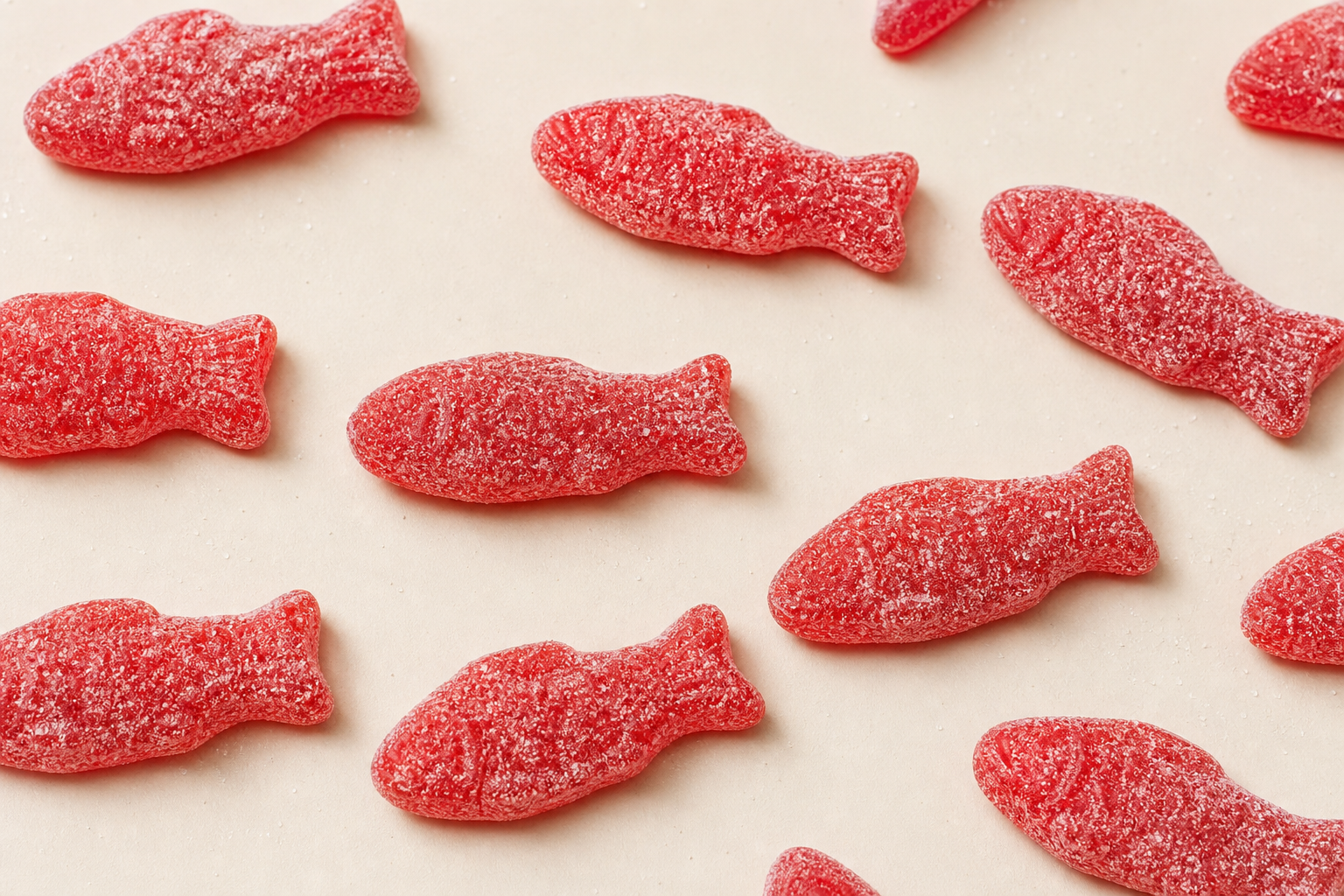 Red Swedish Fish candies dusted with sugar