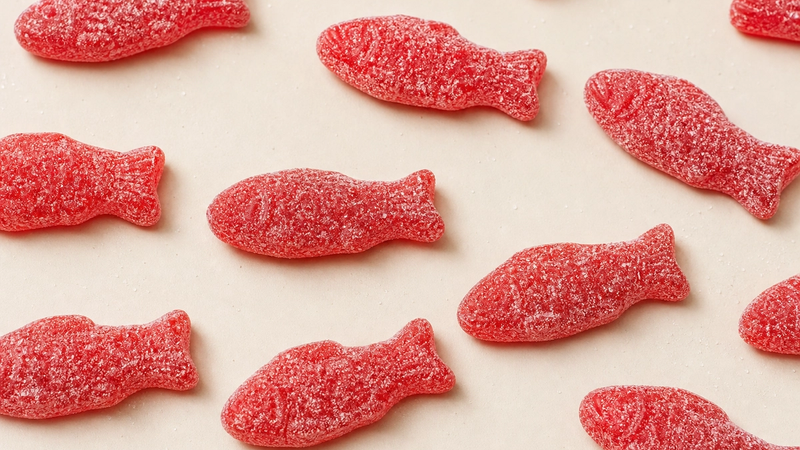 Red Swedish Fish candies dusted with sugar