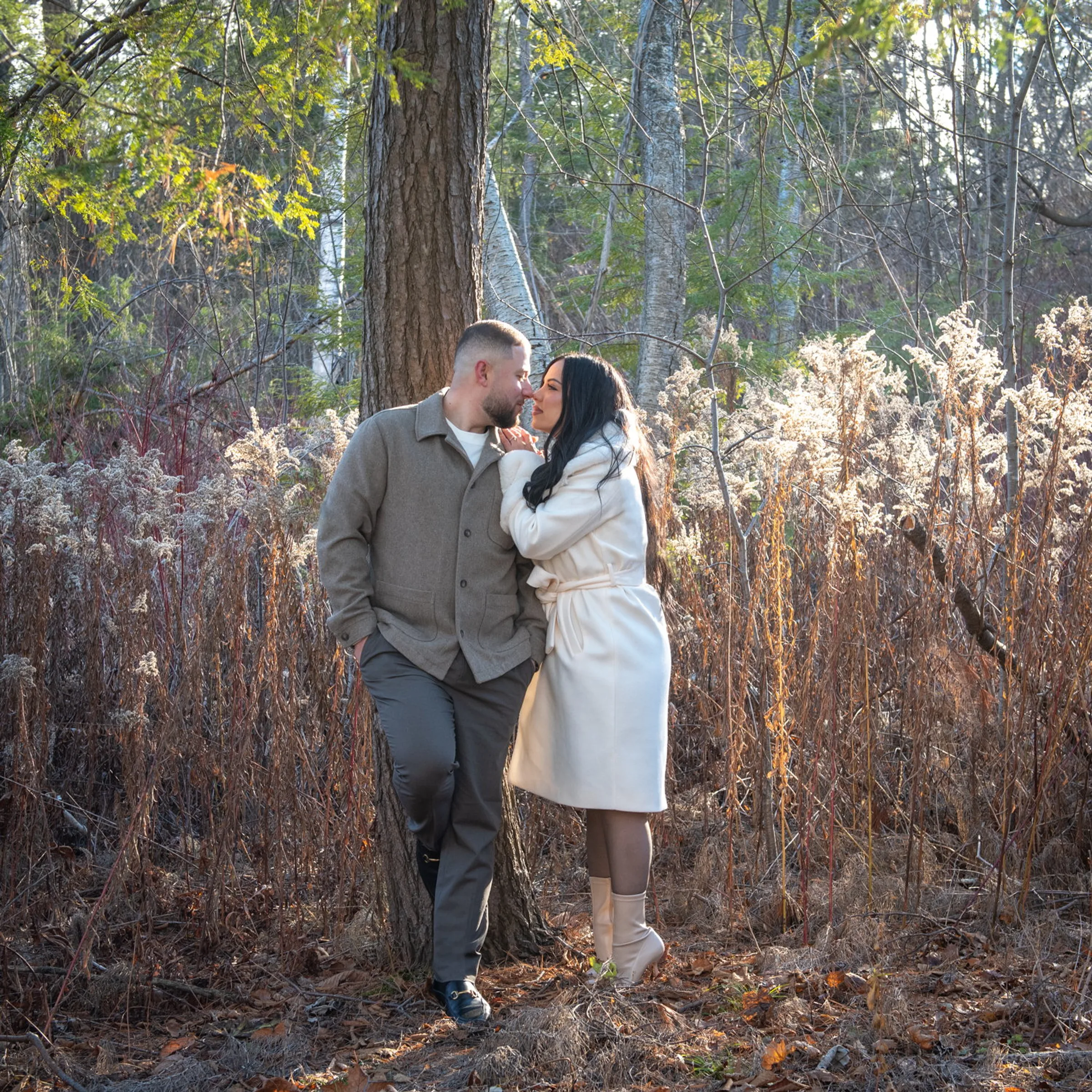 Couple A among goldenrod at the treeline