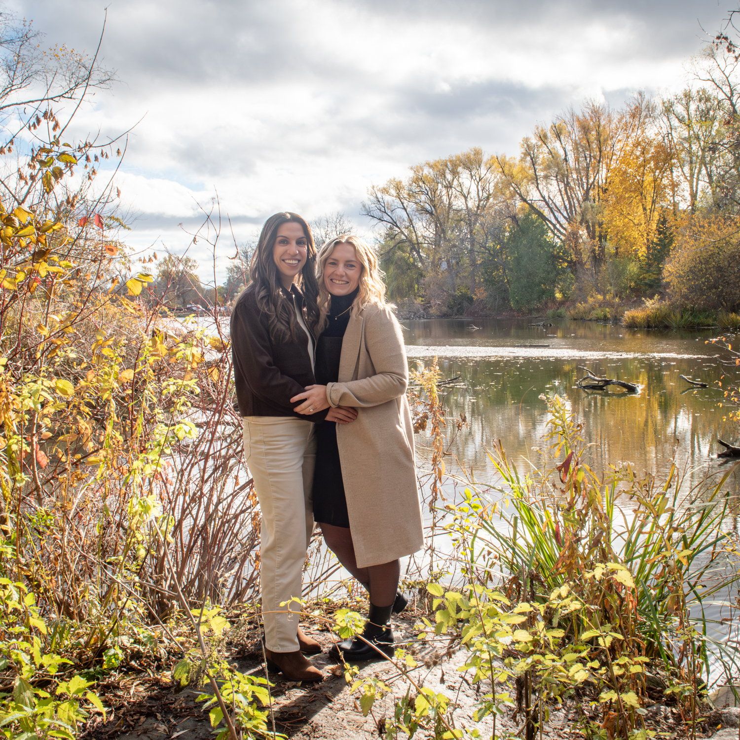 Stephanie & Carlie during their outdoor engagement session at a Toronto-area park