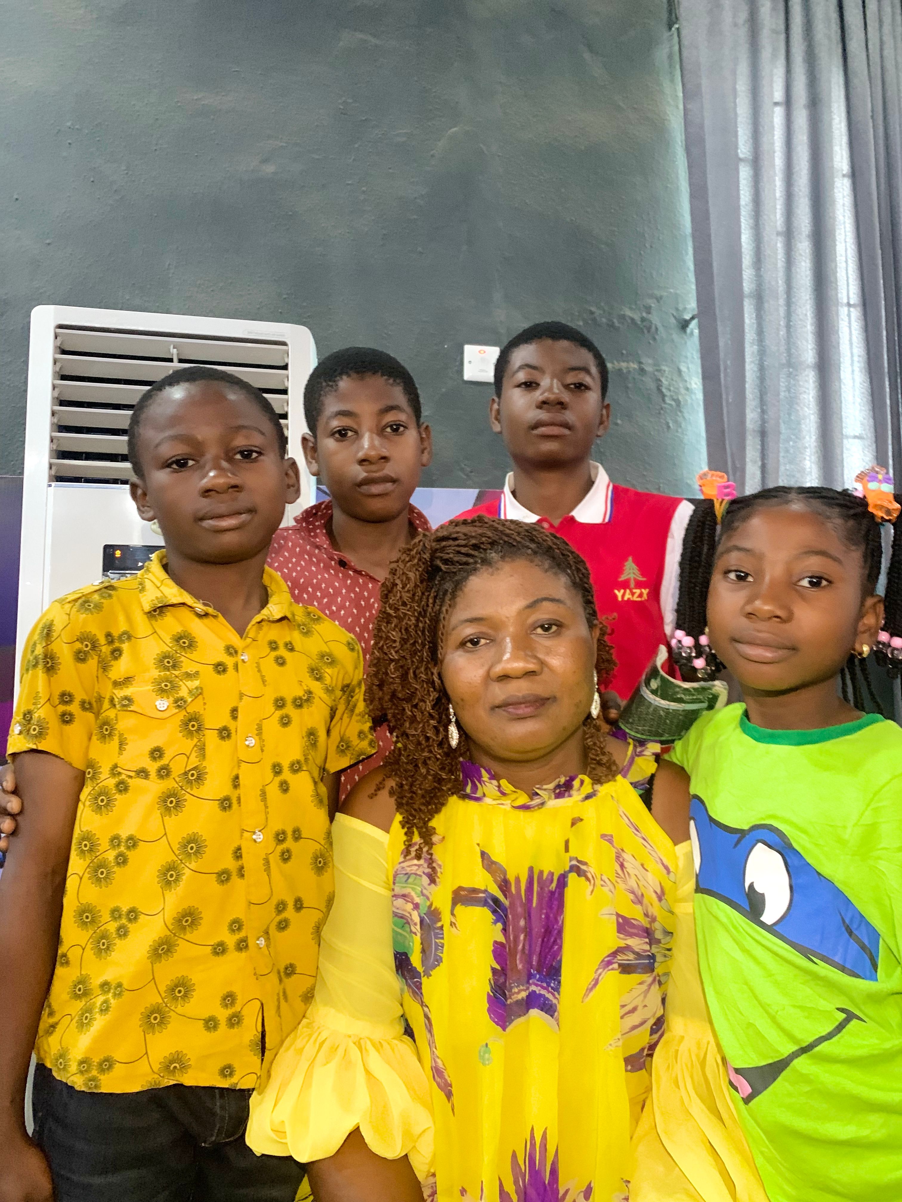 Picture of Mrs. Nneoma Emmanuel and her kids