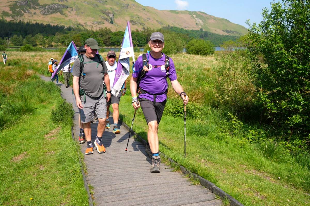 3 Dads Walking lead out hikers at KMF 2024