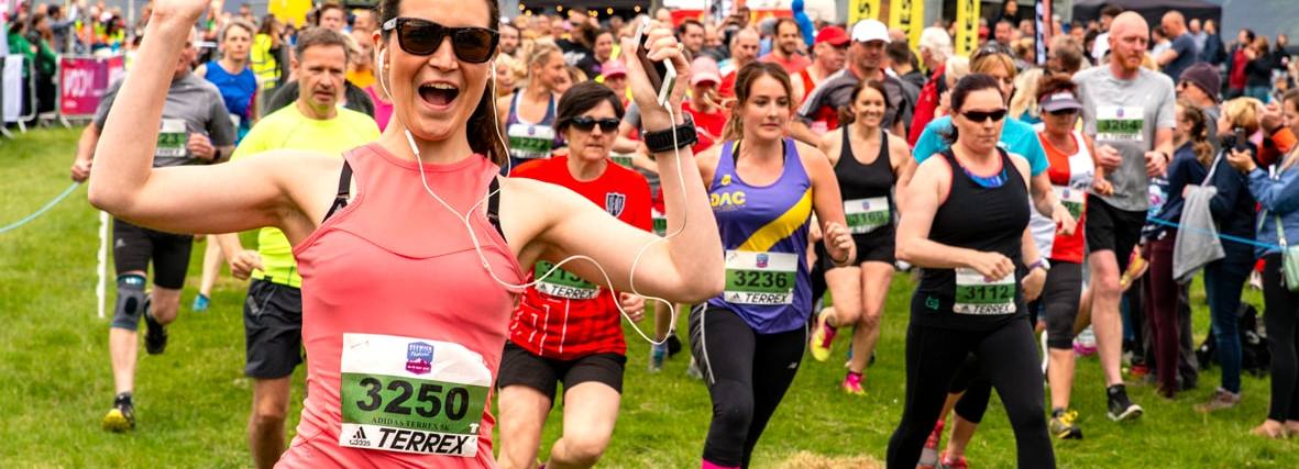 Runners taking part in the adidas TERREX 5K Trail Run during 2019 KMF