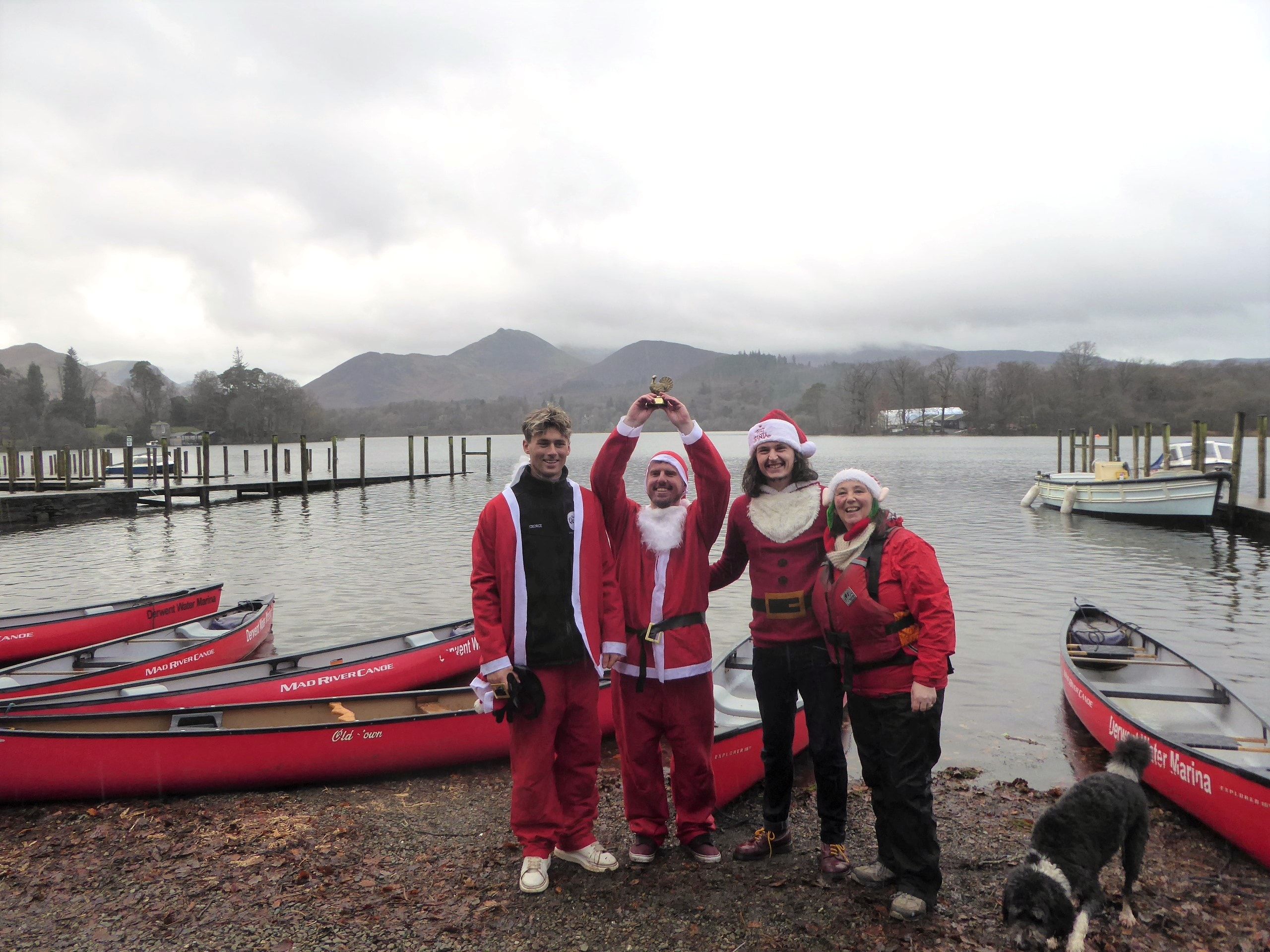 Santa Splash winners George Holder, Mel Swanwick and Jack Ellis from The Quiet Site and Vanessa Metcalfe, Keswick Tourism Association Tourism Manager