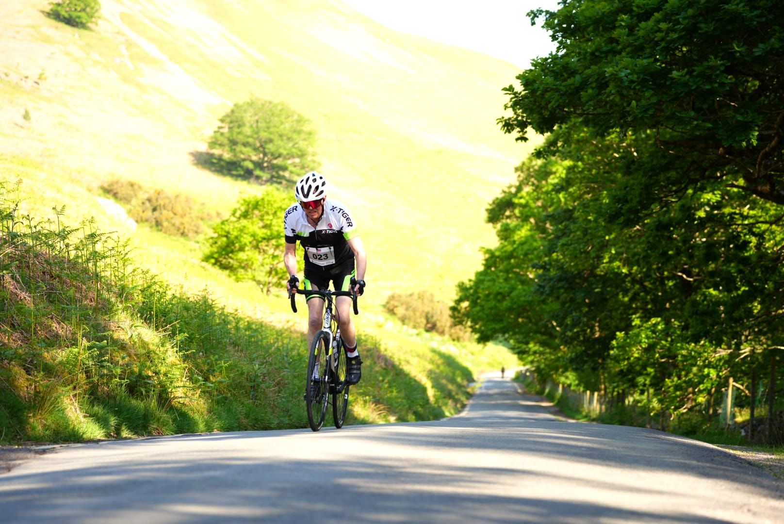 A cyclist in action at KMF 2024