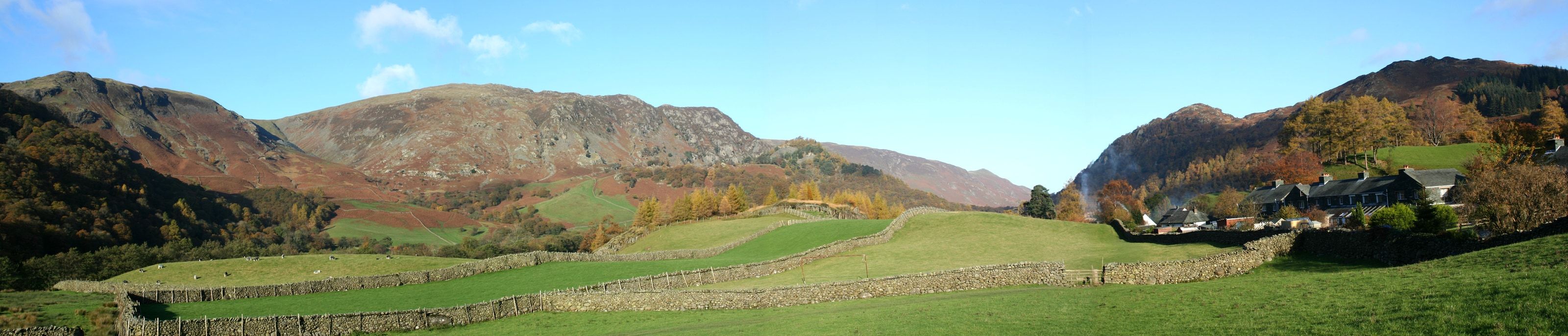 The Langstrath valley running back into the fells with autumn colour on the lower slopes