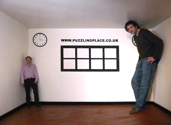 Illusion room in the puzzling place, tall and tiny person