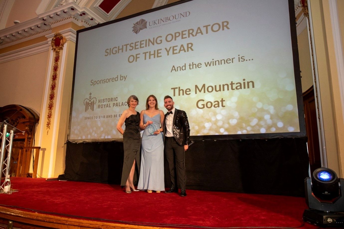 Mountain Goat Group Sales and Marketing Manager, Asia Connor (C), receiving the award.