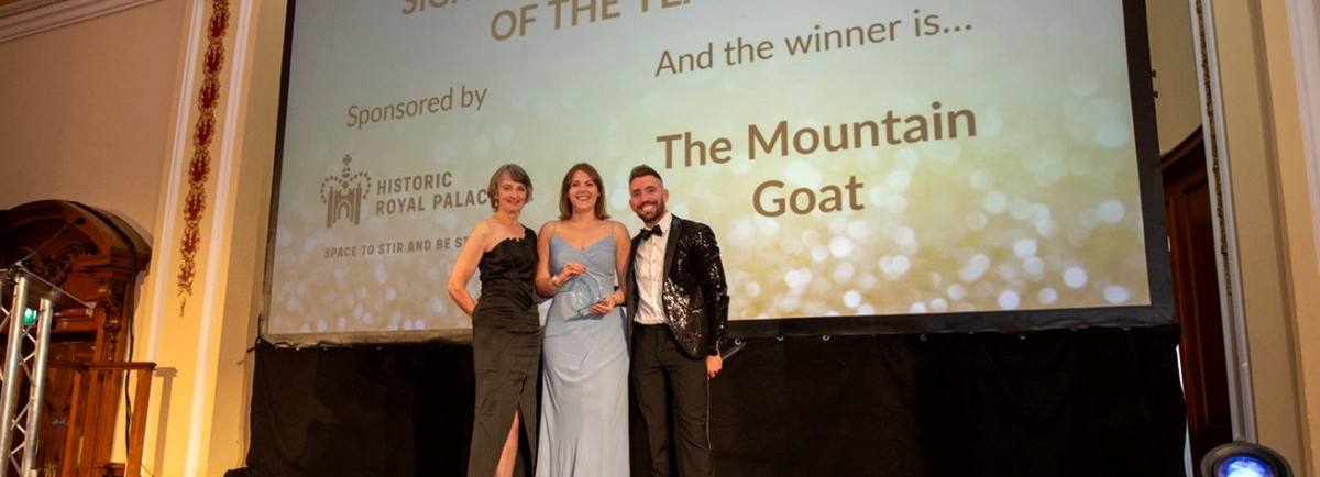 Mountain Goat Group Sales and Marketing Manager, Asia Connor (C), receiving the award.