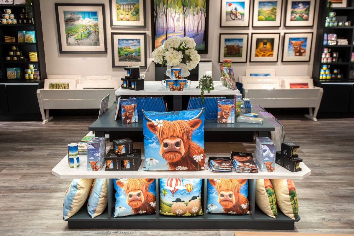 Inside the new gallery showing some of the paintings and other products