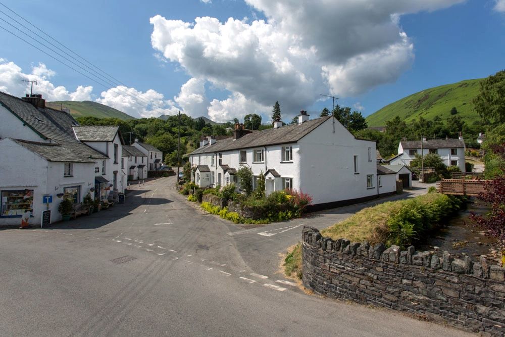 The junction of Braithwaite village with its stone cottages and low walls