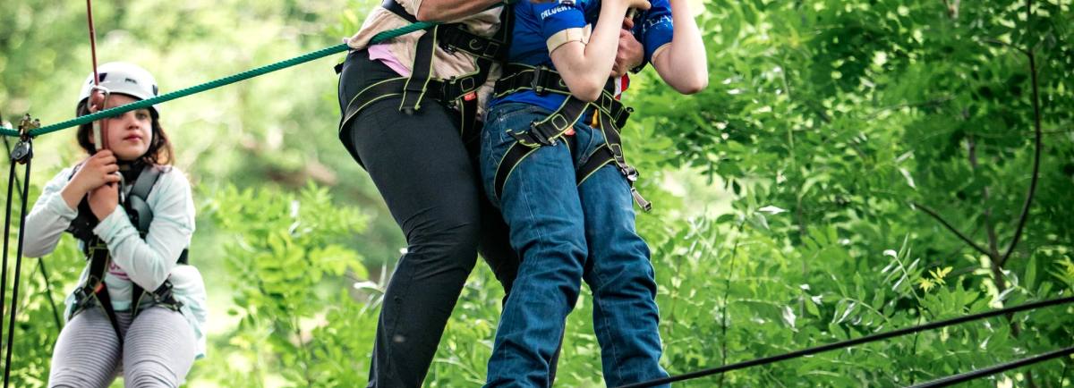 Oliver Voysey supported by mum Sarah and watched over by sister Elizabeth, aces the Calvert Lakes high ropes course
