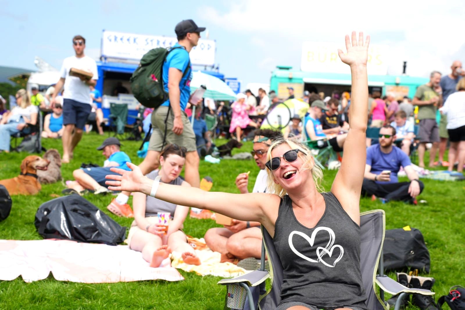 Relaxing in the Festival Village at KMF 2024
